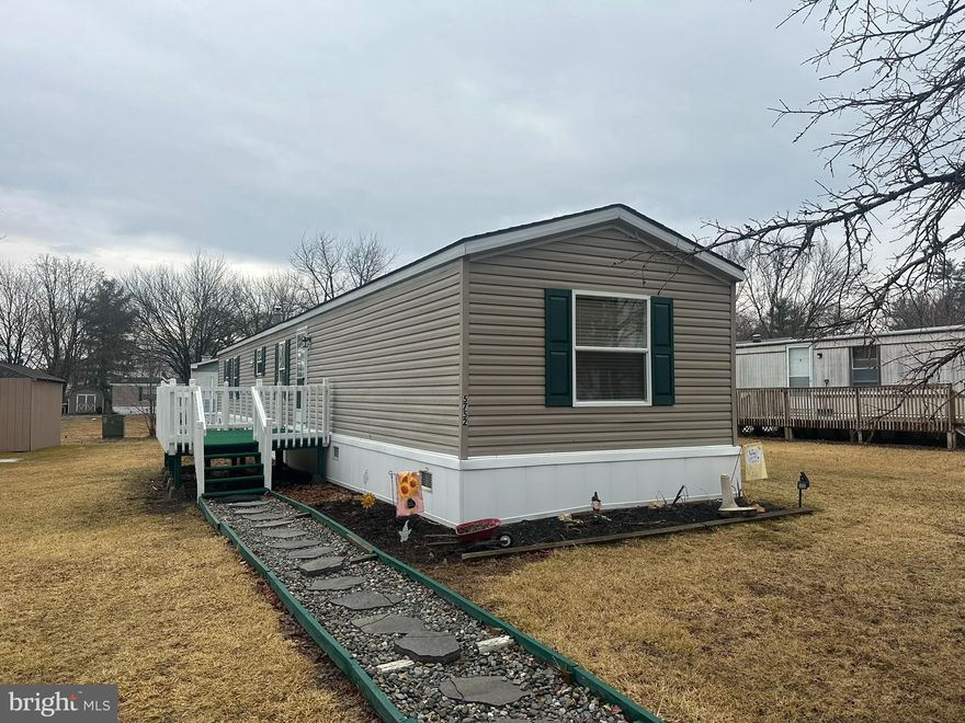 Northwestern School District 3 bedroom, 2 full bath home in the quaint Heidelberg Acres manufactured home community. Split floor plan with master bedroom/bathroom at the back of the home. Nice, quiet location that is just a couple minutes off Routes 100 and 309. Easy drive to most locations in the Lehigh Valley. This home is in excellent condition – brand new kitchen cabinets and countertops plus new stainless refrigerator and gas stove. New water heater. New carpet and flooring throughout. Most of the vinyl windows were just replaced. In 2022, the home had new Central A/C unit, all new plumbing, and insulated skirting installed. There is a wood burning fireplace in the living room. Laundry room equipped with a washer and dryer. Huge storage shed and a spacious yard. One dog per household is permitted. Lot rent is $525/month including water and sewer. Trash is billed at $35/month. Total yearly taxes are just $225 with the Homestead Discount. Seller financing is possible.