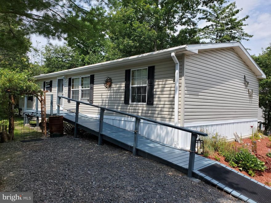 Welcome to 168 Damascus Rd.!  Beautiful, well maintained Double Wide in  the highly desirable community, "The Pines at West Penn".   One floor living at it's best, this home boasts new carpet, a nice size living room, generous sized kitchen with all appliances, a  separate dining area, laundry room, and three bedrooms.  Also, the sizeable primary bedroom (with it's own full bath)  has plenty of space for a large bed and all your bedroom furniture.  Outside you will find a covered deck where you can sit and enjoy your own private oasis, complete with a beautiful Koi pond and small above ground pool. In addition, the lot is tastefully landscaped with a fully fenced back yard that would be perfect for any pet owner.  Plenty of off street parking, low taxes, and low lot rent.  Schedule your showing today, as this one won't last long!!  Immediate possession possible.  Any accepted offer would be contingent of buyer being approved by the "Pines at West Penn". ***Motivated Seller*** With an accepted Full Price Offer,  Seller is willing to remove pool, as well as offer  a "Seller's Credit" of up to $3000 for the installation of Central Air!!     ***Open House Scheduled for 9/23/2023 has been canceled due to pending agreement***