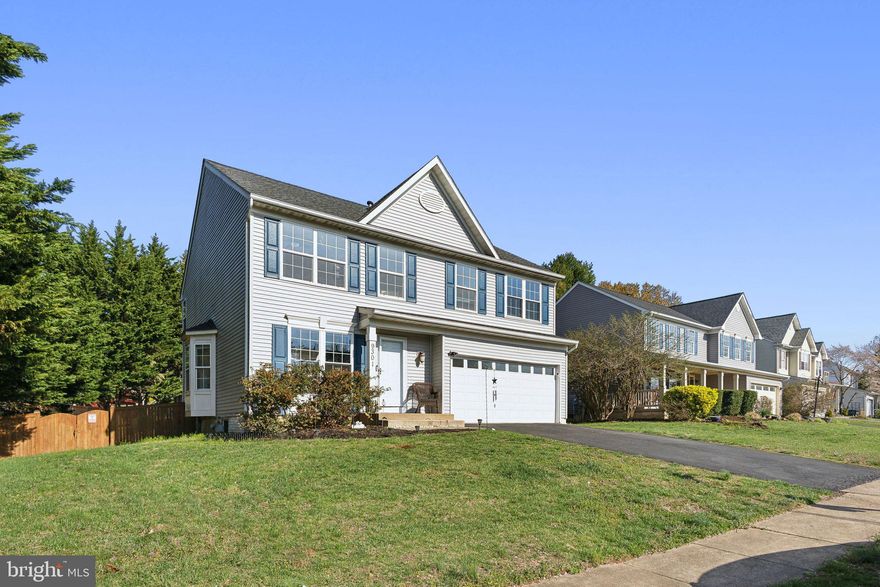 Welcome to this exceptional 5-bedroom, 4 bathroom home in the sought after community of Manassas Park! This beautifully designed home boasts an open-concept layout that invites an abundance of natural light, creating a bright and welcoming atmosphere throughout. The chef inspired kitchen is a true focal point, featuring sleek stainless steel appliances, gorgeous granite countertops, and a spacious island that offers both prep space and a perfect spot for casual dining or entertaining. Just off the kitchen, the large deck provides an inviting space for outdoor living ideal for enjoying your morning coffee, hosting weekend barbecues, or relaxing while overlooking the expansive backyard, perfect for family gatherings or a serene retreat. Upstairs, the primary bedroom is a true sanctuary, offering a peaceful with plenty of space to unwind. The custom walk-in closet is a standout feature, designed to offer ample storage and organization. The en-suite bathroom features a soaking tub, a separate glass enclosed shower, and dual vanities, creating a spa like experience for your daily routine. Three additional generously sized bedrooms upstairs provide flexibility for family, guests, or home offices. The legal lower level bedroom adds even more versatility to this home, making it perfect for an in-law suite, guest room, or private office. It’s a rare find in the neighborhood, providing added privacy and convenience. In addition, the home offers ample parking with a large driveway, ensuring space for multiple vehicles ideal for growing families or entertaining guests. The spacious garage also includes an outlet for an EV charger, offering modern convenience for electric vehicle owners.

With its thoughtful design, high end finishes, and a prime location, this home is truly a rare gem in Manassas Park.