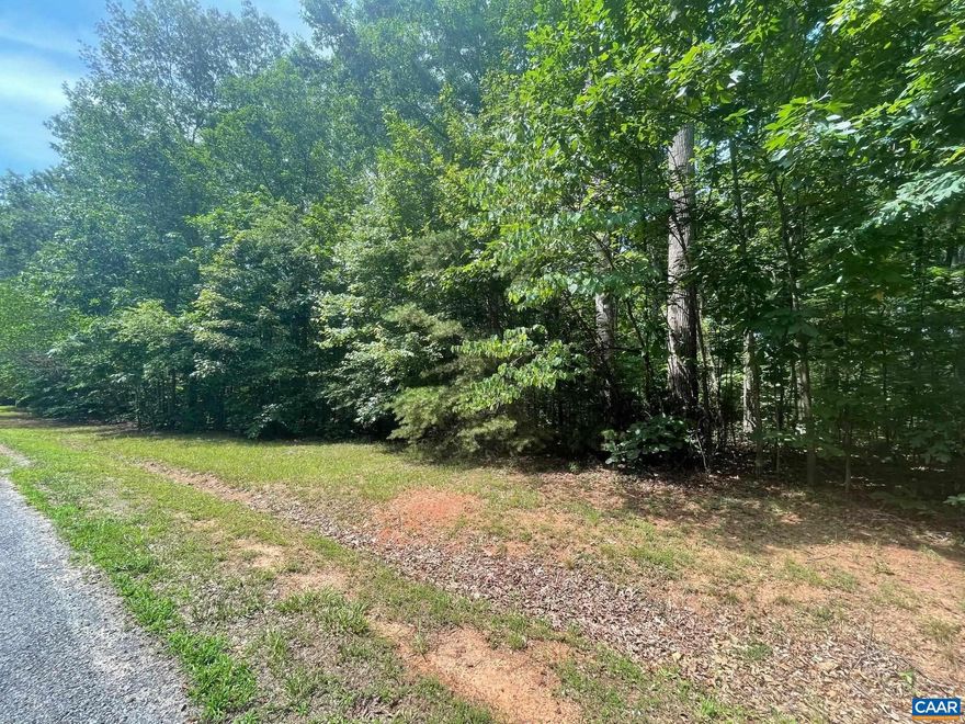 Price Improvement! Now offered at $154,900 - don't miss this opportunity to make your dream come true!  2-Acre Wooded Lot in Sunrise Bay - Lake Access has an assigned Boat Slip that conveys with the sale of the property!!  Build your dream home on this beautiful 2-acre wooded lot in the desirable Sunrise Bay community, located on the public side of beautiful Lake Anna. This wooded lot offers privacy, natural beauty, and the freedom to bring your own builder to create a custom home that fits your lifestyle.  Enjoy direct lake access and the convenience of a deeded boat slip, making lake life easy and accessible. The neighborhood also features a nearby park - perfect for picnics, dog walking, children's play, and even a game of soccer.  Whether you're looking for outdoor adventure or peaceful relaxation, this location offers the best of both worlds.  Don't miss this rare opportunity to own a slice of paradise in one of Lake Anna's most sought-after neighborhoods.  Soil work is available.