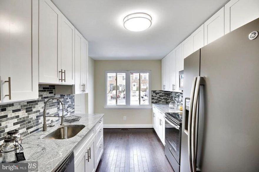 Don't miss the opportunity to rent this beautifully updated townhome!  It boasts numerous upgrades including stainless steel appliances, granite countertops, newer carpeting, neutral fresh paint, hardwood flooring throughout the main level and much more.  Fully finished basement with new washer and dryer. Available for lease on November 2nd  ** Non Smoking**No Cats**Dogs on case by case basis**