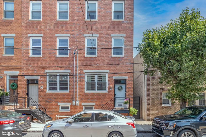 Welcome to your next home in Philly's very popular section of Pennsport! 

Recently built in 2017, and located on a family-oriented block just off Dickinson Square, this home is move in ready with a modern design, and a lot of charm. This home has a ton of a natural light, an open floor concept, very high ceilings, and beautiful flooring. The kitchen is spacious, with a larqe countertop that holds plenty of room for seating, and leads into the backyard area perfect for rest/relaxation on a nice day. The backyard also has an alleyway that leads to the front of the house to make things easy on trash day!

The second floor has two very spacious bedrooms and also has great natural lighting. The full bath located off the hallway has a tub, and dual sinks. The third floor is where the large primary bedroom is located. The primary has a spacious walk-through closet, which leads to the second full bath which is large, spacious and has a beautiful stand in shower. The third floor also offers a wet bar in the hallway which leads to the roof deck that shows the beautiful views of Philly. Look south: you'll see the home of the Super Bowl Champs. Look Northeast, you'll see the Ben Franklin Bridge. Look Northwest, and you'll see a stunning view of the Center City skyline. You can't miss with these views!

Last but not least, the fully finished basement. The lower level is a versatile space, which includes a laundry area, a half bath, and a storage/mechanical room. This space can be used as a media room, home office, gym, or playroom— adaptable to meet your specific needs. Conveniently located near parks, shops, restaurants, transportation, and the waterfront, this home also includes a tax abatement with 2+ years remaining. Welcome to 205 Mountain Street!