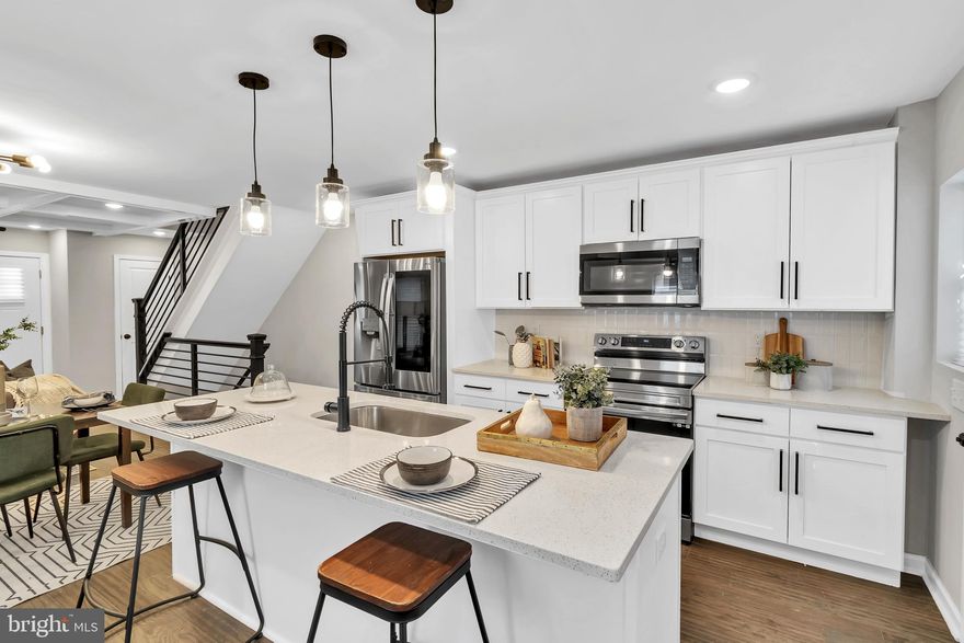 Multiple offers - Highest and best due by 3 pm  2/24/2023

3 levels of Luxury best describe this Modern porch front 4-bedroom, 2 full baths Home w/ Trey Ceiling, Recess Lights, High-end fixtures, & custom staircase rails. Chefs Kitchen Featuring stainless steel appliances, Quartz Countertops, 5 Burner Stove w/over-the-range microwave, & custom backsplash.  Bathrooms w/ masterful tile work, New vanities, and modern fixtures. Finished Basement w/ French drain waterproofing system, walkout access to the large fenced-in yard is great for entertaining. New Plumbing, HVAC & Electric permitted & inspected.   The home is also within walking distance (approximately 2 miles) from the 745-acre Druid Hill Park which features the following Amenities: Playgrounds, Tennis Courts, Ball fields, Athletic fields, Disc golf course, Pool, Basketball Courts, Greenhouses, Picnic groves/pavilions, Howard Peter Rawlings Conservatory and Botanic Gardens, Zen garden, Urban greenway park, Jones Falls Trail, City Farms Garden, Safety City, & Lakeside Loop Trail around Druid Reservoir. Luxury Living at Affordable Pricing!