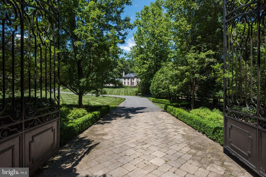 NEW LOOK! Unparalleled gated estate on 5 private acres w/ manicured grounds by Charles Owen Fine Landscaping includes pool, gorgeous gardens, patio & outdoor FP. Elegant main floor embraces intimacy & expansive entertaining with grand Formal Rooms, Library, Kitchen w/ high end appliances. Master Suite w/ 2 walk-in closets, Spa like bath w/ steam shower. Lower level Rec Room w/ Bar & Kitchenette, Billiard Room, Fitness Room, Bedroom & Full Bath.