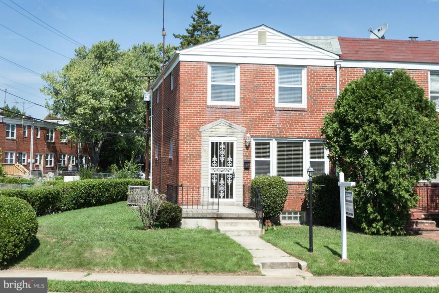 Freshly renovated all brick end unit townhouse. Hardwood floors throughout and finished basement with half bath that can be used as a 4th bedroom. Features granite counters, new stainless steel appliances, granite bathroom vanity and off street parking. New hot water heater being installed.