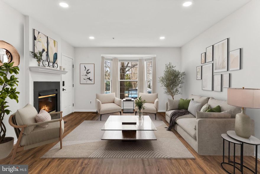 Discover easy living in this rarely available 3-bedroom, 2-bath, two-level condo in the highly desirable Westwood Village community. Offering 1,530 square feet, this home combines the spacious feel of a townhome with thoughtful modern updates throughout.
Step inside to an inviting open-concept main level featuring a bright and airy living and dining area anchored by a cozy fireplace that creates warmth and character while defining the space. Large windows fill the area with natural light, making it ideal for both everyday living and entertaining.
The modern kitchen showcases stainless steel appliances, ample cabinetry, and a charming breakfast nook. Sliding glass doors lead from the breakfast area to a private balcony—perfect for morning coffee or unwinding in the evening.
Downstairs, you’ll find three generously sized bedrooms with ample closet space. The primary suite is a serene retreat featuring vaulted ceilings, a spacious walk-in closet, and a beautifully remodeled primary bath designed for comfort and style. A convenient laundry area completes the lower level.
Nestled along the Vesper Trail in Tysons’ last forest, this home offers a peaceful setting just half a mile from the Spring Hill Metro (Silver Line) and close to shops and restaurants. Enjoy easy access to Wolf Trap via a short walk or bike ride.

Additional highlights include one assigned parking space directly in front of the home, plus additional resident and guest parking. Community amenities include a clubhouse with a fitness center, outdoor pool, and hot tub—located in front of the building..

With quick access to major commuter routes, Metro, dining, and shopping, this home offers the perfect blend of comfort, convenience, and lifestyle in the heart of Tysons.