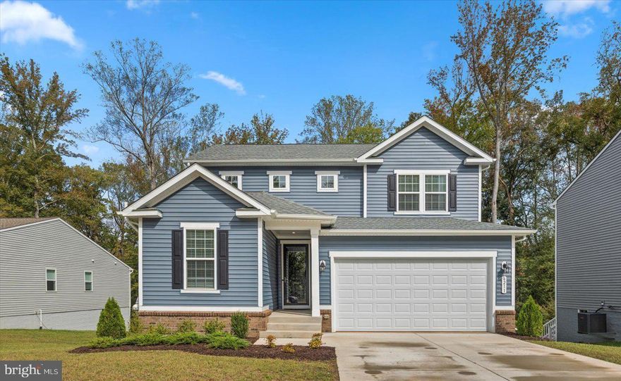 2-year-old Colonial on Cul-De-Sac *  Backs to trees *  Neutral decor throughout  *  Kitchen with 42 inch white on white cabinets, stainless steel appliances, large center island, pantry and quartz counter tops * 9 foot ceilings and  LVP flooring on main level *  Upper level features primary suite with luxury bath and walk in closet,  spacious bedrooms,  full hallway bathroom with double sink  and laundry room *  Lower level has full basement with walk out to rear yard  * 2 car garage *  Community amenities including a clubhouse, massive pool, tennis courts, 24-hour gym, walking/biking trails, Rappahannock River access with boat ramp, trash service, and snow removal. Centrally located for convenience, the property is just minutes from the Food Lion shopping plaza, a short drive to Wal-Mart, and within easy reach of historic downtown Fredericksburg with commuter train, Dahlgren, Central Park, Spotsylvania Towne Centre, Caledon State Park, and Colonial Beach.