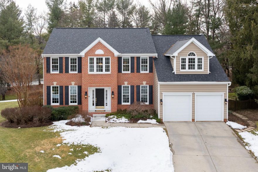 Welcome to this beautifully appointed brick-front colonial in Hunt Valley Station, ideally situated at the end of a quiet cul-de-sac with a fully fenced private backyard and open side yard. Lovingly maintained by the original owners and one of the largest models in the neighborhood, with extensive updates throughout, this home feels refreshed, modern, and completely move-in ready. Step inside to discover a harmonious blend of traditional charm and contemporary design, with neutral paint, high ceilings, custom lighting, and premium finishes throughout—creating a truly luxurious feel. The main level features a completely updated kitchen with all the bells and whistles, opening to a dramatic two-story family room highlighted by a stunning floor-to-ceiling stone fireplace. Rounding out the main level are the living room, dining room, remodeled laundry room, and what the sellers currently use as a game room.  Both the kitchen and living room offer access to the two decks and spacious backyard—perfect for everyday living and entertaining. Upstairs are five true bedrooms, including a primary suite with cathedral ceilings, ceiling fan, sitting room, multiple closets, and a renovated spa-like bath.  Two of the secondary bedrooms are currently used as a dressing room and a home gym but can easily serve as traditional bedrooms.  The finished lower level features high ceilings, recreation space, office/playroom, kitchenette, bonus room, and exterior access—ideal for an in-law or au pair suite. Brand-new hardwood floors, carpeting, and luxury vinyl plank flooring, along with abundant storage, complete the home.  Meticulously maintained, this home delivers space, style, comfort and flexibility for today’s lifestyle. Conveniently located just minutes from I-83, Hunt Valley Towne Centre, restaurants, shopping, and entertainment, with easy access to the NCR Trail offering miles of scenic hiking and biking stretching all the way into Pennsylvania.