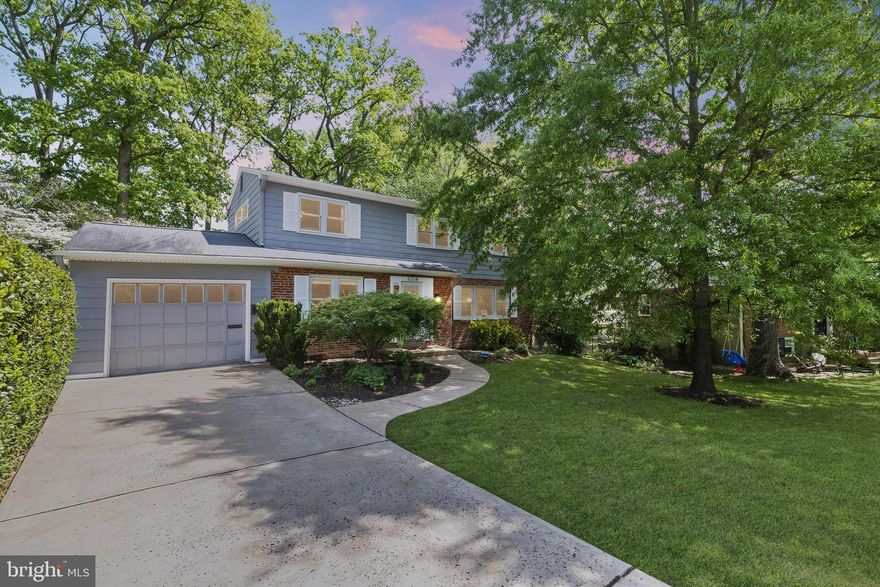 Welcome to this exceptionally maintained 3-level 4 bedroom, 2.5 bathroom home! Upon entering the home you are greeted with gleaming hardwood floors throughout the upper and main levels and a spacious living room that leads seamlessly to the dining room. The kitchen is equipped with every convenience, with recently updated quartz countertops and cabinet storage that makes meal prep a breeze! The family room boasts double French doors that open onto the pergola/patio space. This outdoor entertaining area is the perfect gathering place for summer barbecues or parties with friends and family. The backyard of this property is breathtaking with a meticulously manicured lawn, mature trees, and a fire pit area perfect for creating fun memories. The upper level boasts 4 bedrooms each with generous closet space and beautiful windows that let in ample natural light. The primary bedroom is equipped with its own private en suite bathroom and walk-in closet. On the lower level, you have a large room that could be used as a rec room or hobby area - whatever your heart desires! Located in a quiet neighborhood that is conveniently located to shopping and dining. This is a very pedestrian and bike-friendly neighborhood, you will love the friendly atmosphere! Located just a 10-minute drive from Ft Belvoir. Don’t miss the opportunity to make this home your own!