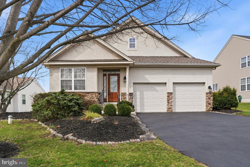 Welcome to this beautifully maintained 2-bedroom 2 bath  home located in the highly desirable Ravens Claw community and the Springford School District offering low-maintenance living . A welcoming front sitting room provides the perfect space for a home office or quiet retreat, leading into a spacious living and dining room combination with hardwood floors, wainscoting and crown molding ideal for everyday living and entertaining. The kitchen features hardwood flooring, granite countertops, 42” cabinets, gas range, center island, and pantry that flows into the adjacent family room featuring a cathedral ceiling and gas fireplace adding warmth and character opens to a light-filled sunroom featuring a cathedral ceiling and sliding doors to a composite deck overlooking the 7th fairway of the golf course with a private outdoor setting.  The primary suite includes a walk-in closet and an en-suite bath with soaking tub, oversized shower with upgraded glass doors and linen closet while the second bedroom and hall bath with linen closet provide comfortable accommodations for guests. Additional features include a 2-car garage with interior access through the laundry room with utility tub, a full basement offering excellent storage or finishing potential, and a new roof for peace of mind. This home combines thoughtful design, easy living, and a prime golf course location with convenient access to Route 422 for easy commuting, always popular Philadelphia Premium Outlets and Manderach Memorial Playground. This home is a must see!
