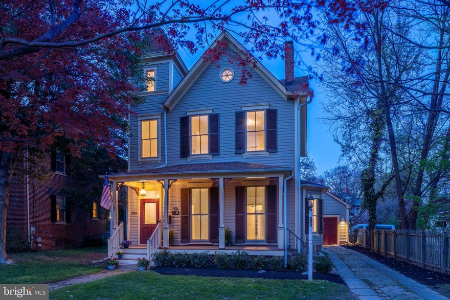 A truly special offering in historic Rockville!  This circa 1884 Queen Anne Victorian beckons with abundant natural light that streams through oversized windows and into rooms featuring nearly 10' ceilings, a freshly painted interior, and newly refinished wood floors.  Enter the splendid foyer showcasing a decorative black and white staircase, and turn to gaze at the oversized living room with a fireplace and built-in bookcases.  The banquet-sized dining room is next, with its gracious bay window, and next to that the adjacent private office/Zoom room.  The stunning kitchen follows, with brand new white shaker cabinets, a new SS fridge with icemaker, a new SS dishwasher, sink and disposal, new stone counters & 4-year-old gas range.  Focal points in the space include the floor-to-ceiling bookcases, a built-in pantry closet, and the sleek center island juxtaposed with an exposed brick wall.  The kitchen has plenty of table space and opens into the huge family room addition with walls of windows to enjoy the view of the gardens beyond.  A wraparound composite deck off the family room has an exit to the driveway and the two-car (tandem) garage.  The upper level has four roomy bedrooms, two remodeled bathrooms, new washer and dryer, and new carpet in the owners' suite addition.  New lighting fixtures throughout as well!  A spiral staircase leads to a finished loft/office/play space with plenty of storage space in the eaves storage and access to mechanical equipment.  In addition to the 2024 renovations, the roof was replaced, the water heater in installed in 2024, the boiler in 2021, and the heat pump in 2009.   The location is ideal - a half mile to Rockville Metro, just a few blocks to Rockville Town Center dining, theaters and shops, Dawsons Market, and the schools of the award-winning Richard Montgomery cluster.  Easy access to jump onto I-270 for commuters.  Make this your forever home!