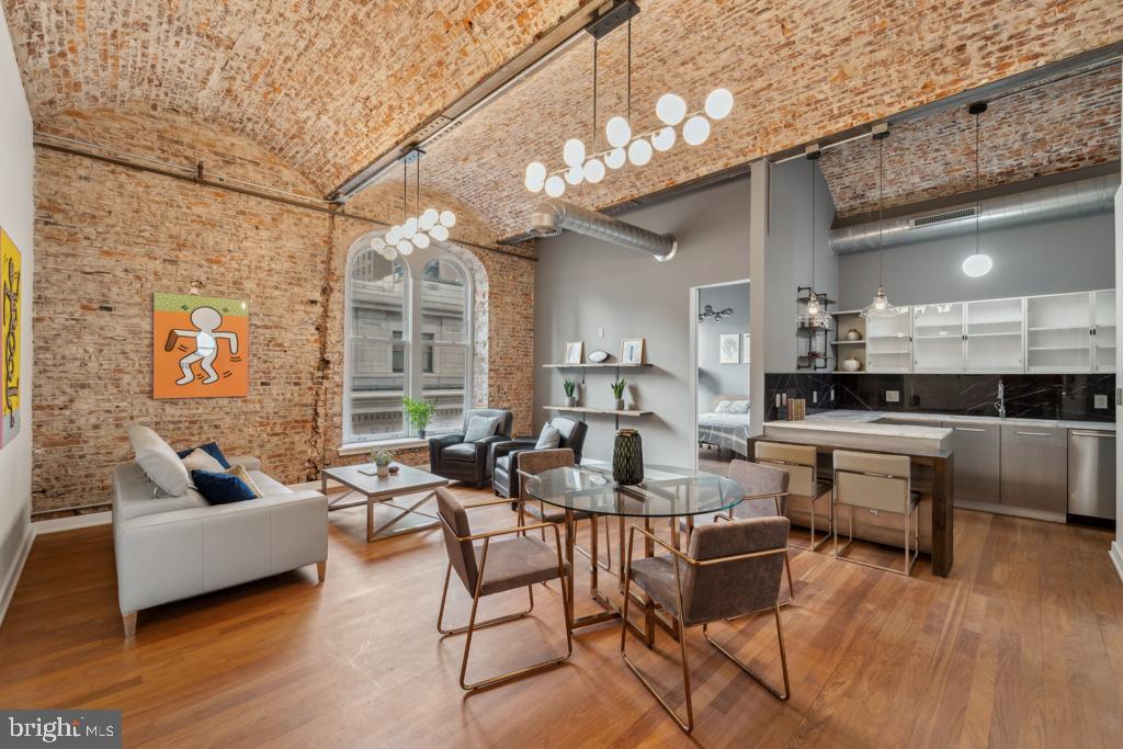 Welcome to 105 South 12th Street, Unit 402—a stunning and sophisticated urban retreat that perfectly balances historic charm with modern luxury. This exquisite 2-bedroom, 2-bath residence offers an artful blend of original character and contemporary elegance. Both spacious bedrooms include large closets and en-suite baths, offering flexible living solutions to suit any lifestyle. High-quality finishes adorn every corner of this home, reflecting refined craftsmanship and timeless style. With in-unit washer and dryer, front door security, a private fitness center, a mail/package room, and elevator access, convenience is at your fingertips. Located in the heart of Center City, this home is just steps away from Philadelphia’s vibrant dining and nightlife scene, offering access to some of the city’s finest bars, restaurants, and entertainment venues. With a Walk Score and Public Transit Score of 100, everything you need is within easy reach. Experience the best of city living in this extraordinary residence—where history, luxury, and convenience converge seamlessly.