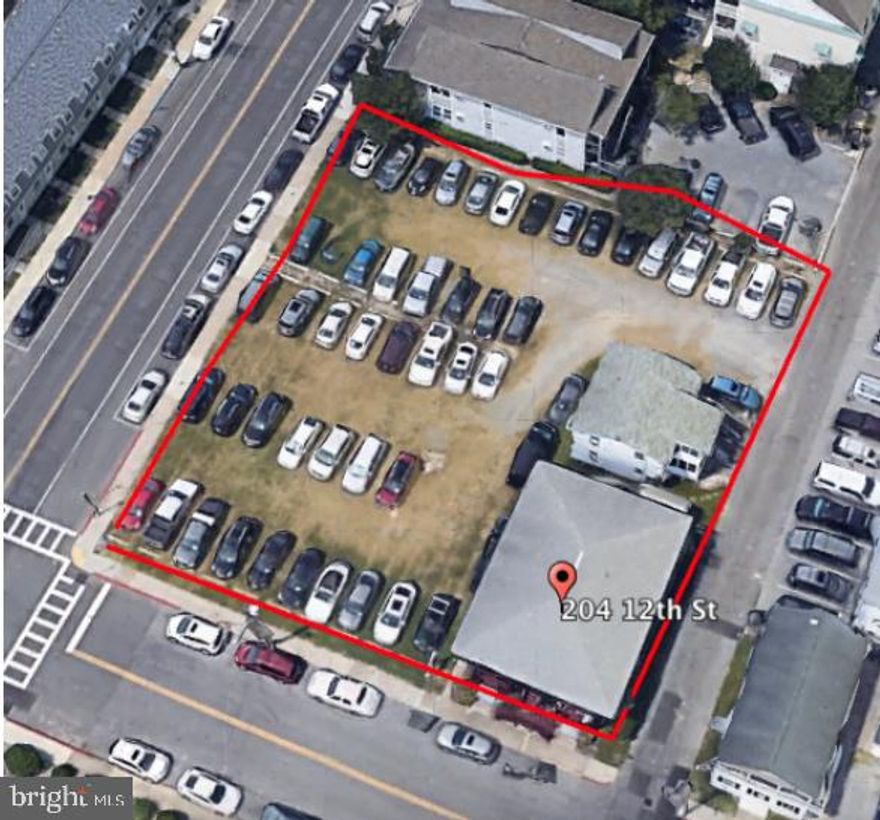 Amazing Opportunity for a developer or the investor.  (6) 2 unit 1 bath fee simple units located in the heart of Ocean City, and just 2 blocks from the ocean, bay, and boardwalk.  Purchase these units and let the $69,000 GRI pay off your mortgage, or purchase these units with the 3 adjoining lots for $1,350,000 totaling 21000 sq ft of land in Downtown OC.