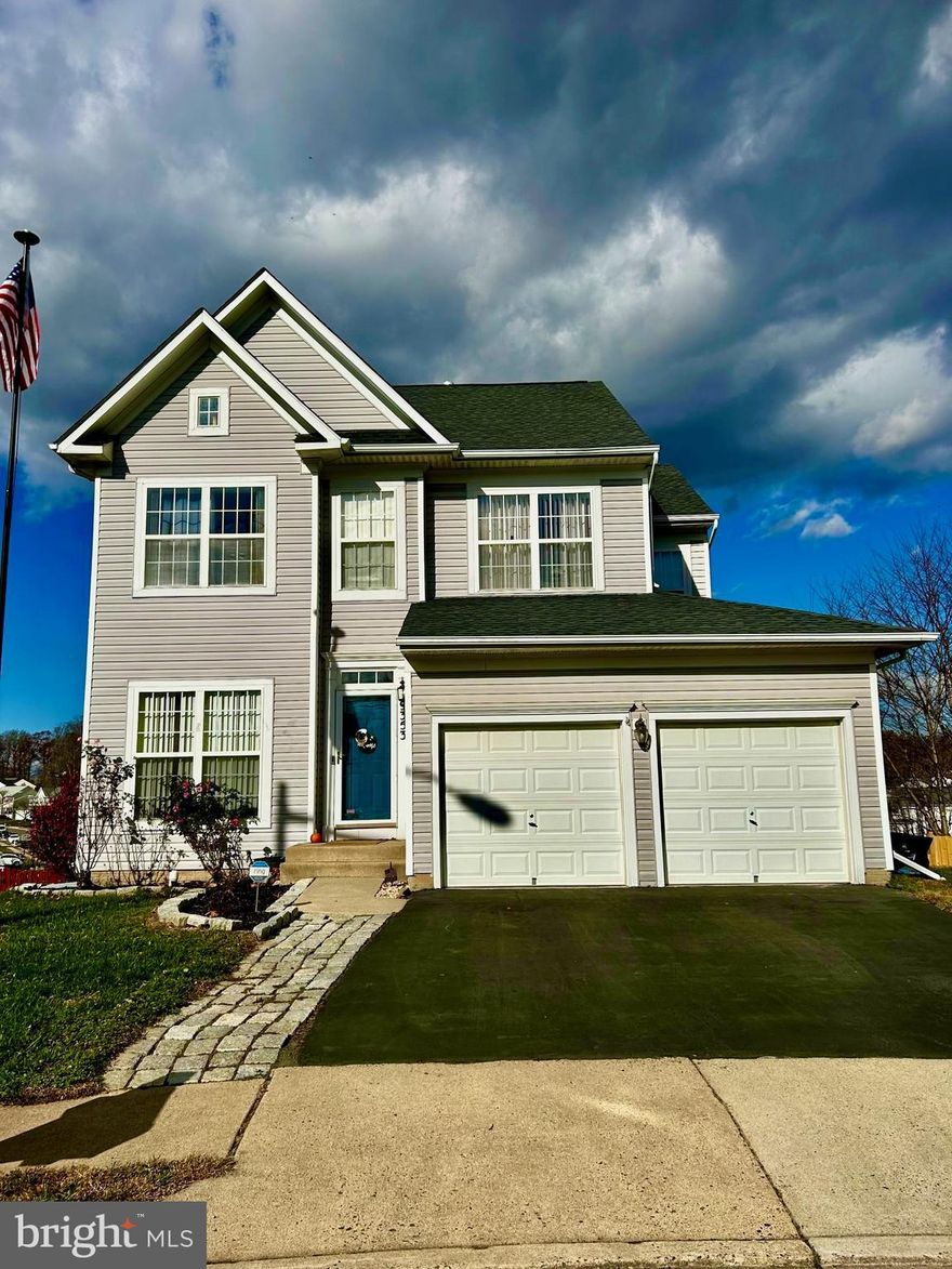 Welcome to this delightful single-family home nestled at the end of a quiet cul-de-sac in highly sought-after Blooms Crossing. Spanning three beautifully finished levels, this home boasts a modern kitchen with granite countertops, and newer (2022) appliances. Gleaming hardwood floors on the main level complement the open layout, featuring a spacious living room and a bright, sun-filled family room that opens to a charming screened-in porch.
Upstairs, discover four generously sized bedrooms and two full bathrooms, including a primary suite with dual closets and an en-suite bath with a soaking tub and double vanities. The expansive walk-out basement offers versatile living space—perfect for a recreation or media room—complete with a bedroom, full bathroom, and direct access to the rear patio.  HVAC replaced in 2023
Step outside to the enormous fenced backyard, ideal for outdoor entertaining, play, or relaxation.   Conveniently located near major commuter routes, shopping, dining, and Hemlock Overlook Regional Park’s scenic trails. Just minutes from the VRE station, local schools, and historic Old Town Manassas, this home combines comfort, style, and location—truly everything you’re looking for!