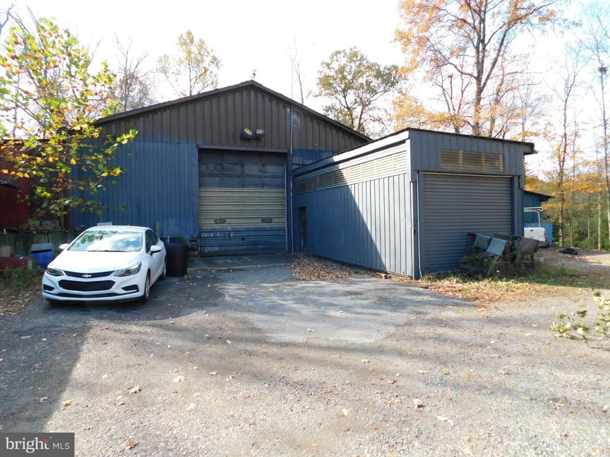 8.8 acres of land in Exeter Township.  Zoned Light Industial District. The property has public sewer, a private well and electicity. There is a large garage (4,230 square feet) used as a Truck repair shop and also several smaller garages. Property is located dminutes from Route 422 & Interstate 176. Part of the property is located in a flood plain.  Please contact liting agent for additional informaton about this site.