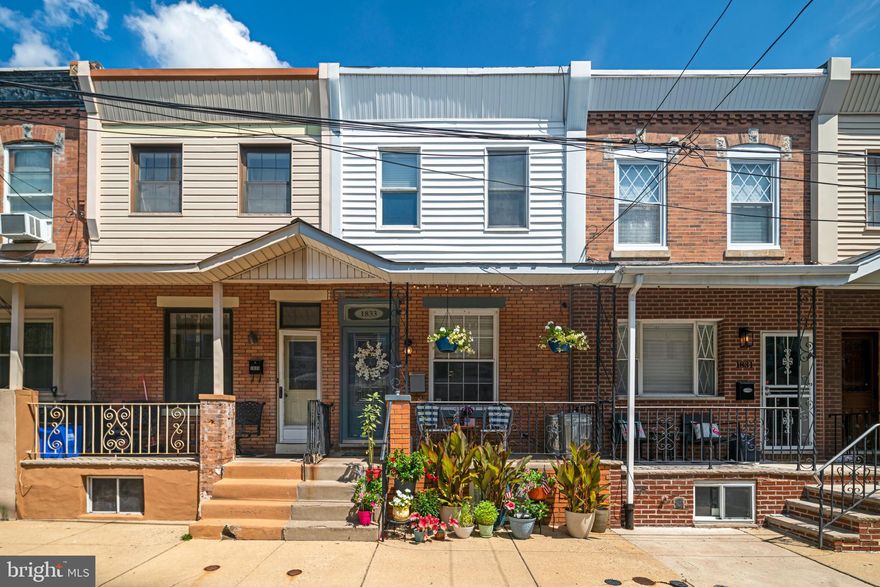 Welcome to 1833 Gladstone Street! This beautiful home features 2 bedrooms, 2 bathrooms, and 1,012 square feet of living space. As you enter the home you will notice hardwood flooring throughout along with the open floor-plan living/dining area. The kitchen is equipped with stainless steel appliances and tons of cabinetry for storage. This main level also gives access to the newly paved back patio! This serves as a beautiful private oasis during warm weather along with a great game day hangout spot. The patio also comes with the outdoor lounge set, grille and TV! As you make your way upstairs you will find both spacious bedrooms, equipped with plenty of closet space and 1 full bath.  The primary bath is built with a large vanity that has ample storage space and a jacuzzi tub! 1833 Gladstone Street is complete with a newly finished basement, perfect for a second living room, fitness center, home office, or even an extra bedroom with the additional full bathroom. Finally, this home is equipped with NEST healing/cooling control system, along with the Central AC system located on the roof, keeping bedrooms cool during all seasons. In close proximity to KayKay's bakery on the corner, Stephen Girard Park, and tons of bars and restaurants, schedule your showing today!