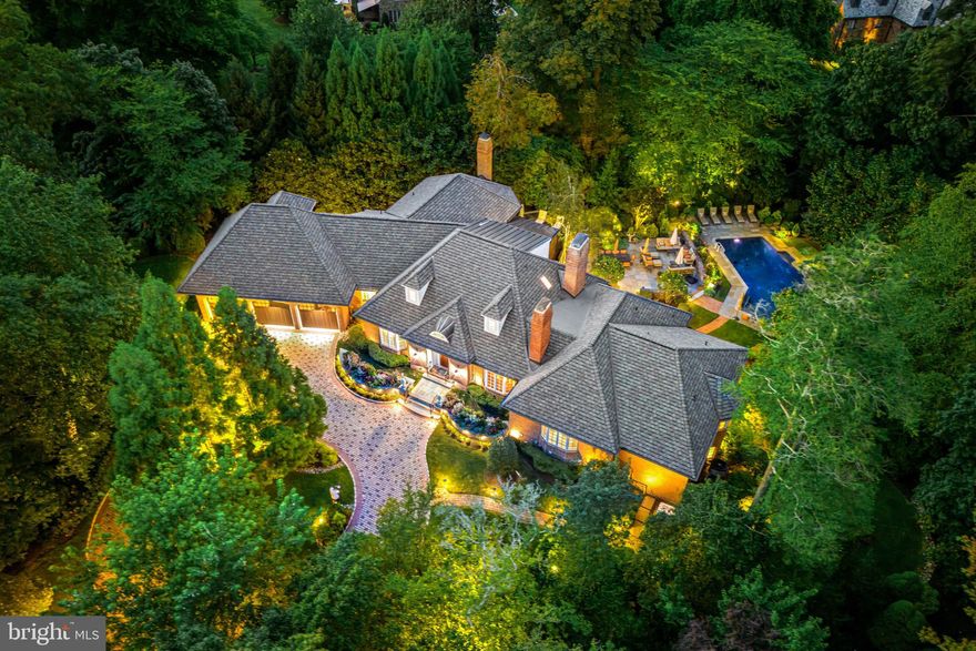 Look no further!! Set on a breathtakingly beautiful  cul-de-sac lot on one of North-side Haverford's most coveted streets, this exceptional gated residence was completely gutted, remodeled and expanded over a 2-year period in 2006. It offers a sun-filled open flow, gracious room sizes, stunning materials, millwork, flooring and designs, easy first floor living, private secondary bedroom suites, elevator and private views of the spectacular saltwater pool, terraces and gardens throughout. Features include a welcoming entry foyer with floating curved staircase, spacious library with custom paneling, built-ins  and gas fireplace, comfortable living room, spacious dining room with custom built-ins, decorative plaster ceiling and gas fireplace, large gourmet chef's kitchen with custom crafted cabinets by Kennebec of Maine, granite countertops with custom-tiled backsplash, 8-burner gas cooktop with pot filler faucet, 2 Meile dishwashers, Meile double convection oven with warming drawer, SubZero refrigerator/ freezer, 2 Wolf ovens with microwave/ convection and steam options, Miele coffee center, an adjoining breakfast room overlooking the rear grounds, fabulous family room with stone fireplace custom mantle and built-ins and vaulted ceiling, expansive first-floor primary suite with trayed ceiling and gas fireplace, Devon-tiled bathroom, radiant heated floors, soaking air-jetted tub, custom-crafted vanities and frameless glass shower, separate guest suite with gas fireplace and handicapped accessible Devon-tiled bathroom with radiant heated floors and frameless glass shower and more. The second level offers two superbly appointed bedroom suites with custom Devon-tiled baths, also featuring radiant heated floors and frameless glass showers. The extraordinary walk-out lower level offers incredibly well-designed spaces including a sunny 5th bedroom suite, full-service kitchen, 2 custom-tiled baths and full-service bar with easy access to the inviting pool and terraces, expansive game room, second family room and sound-proofed theater room built by Creative Systems and featuring platform seating, a Cinewide screen by Runco, Titan 1080 3D projector and custom speakers with acoustical panels. Absolute move-in condition with a new Certainteed Grand Manor roof, new copper accent roof with copper gutters and downspouts, new Unilock paver system circular driveway, Crestron lighting and more. Walk to trains, endless shopping and dining destinations, walking and biking trails, clubs and renowned schools and Universities. A rare find!