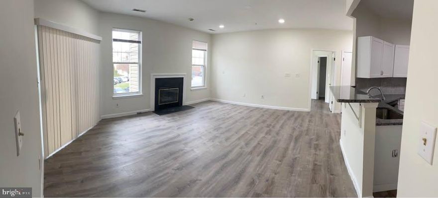 Charming 2-Bedroom, 2-Bath Condo for Rent Move-In Ready! This inviting and fully renovated condo offers comfortable living with modern upgrades throughout. Enjoy an open-concept living room featuring a cozy gas fireplace, perfect for relaxing or entertaining. The updated kitchen boasts brand new cabinets, new appliances, and flows seamlessly into the dining area, creating an ideal space for everyday meals and gatherings. Additional features include beautiful laminate flooring and a full-size washer and dryer conveniently located in the unit