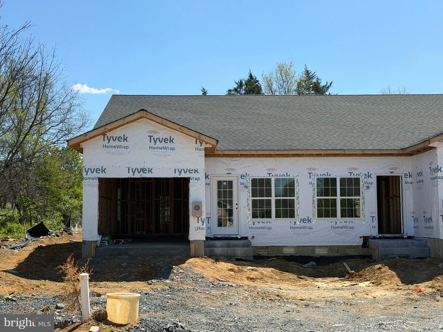 Brand new construction in a newly built quadplex located in the heart of Woodstock, VA, just minutes from the natural beauty and outdoor recreation at Seven Bends State Park—where miles of hiking and biking trails, river access, and scenic vistas await. This thoughtfully designed 3 bedroom, 2 bath unit offers comfortable one-level living with an attached one-car garage. The open floor plan provides a seamless flow between the living, dining, and kitchen areas, ideal for everyday living and entertaining. Spacious bedrooms, modern finishes, and quality craftsmanship throughout make this a great opportunity to own new construction in a convenient location. Real estate taxes currently shown do not reflect a home built on the property.