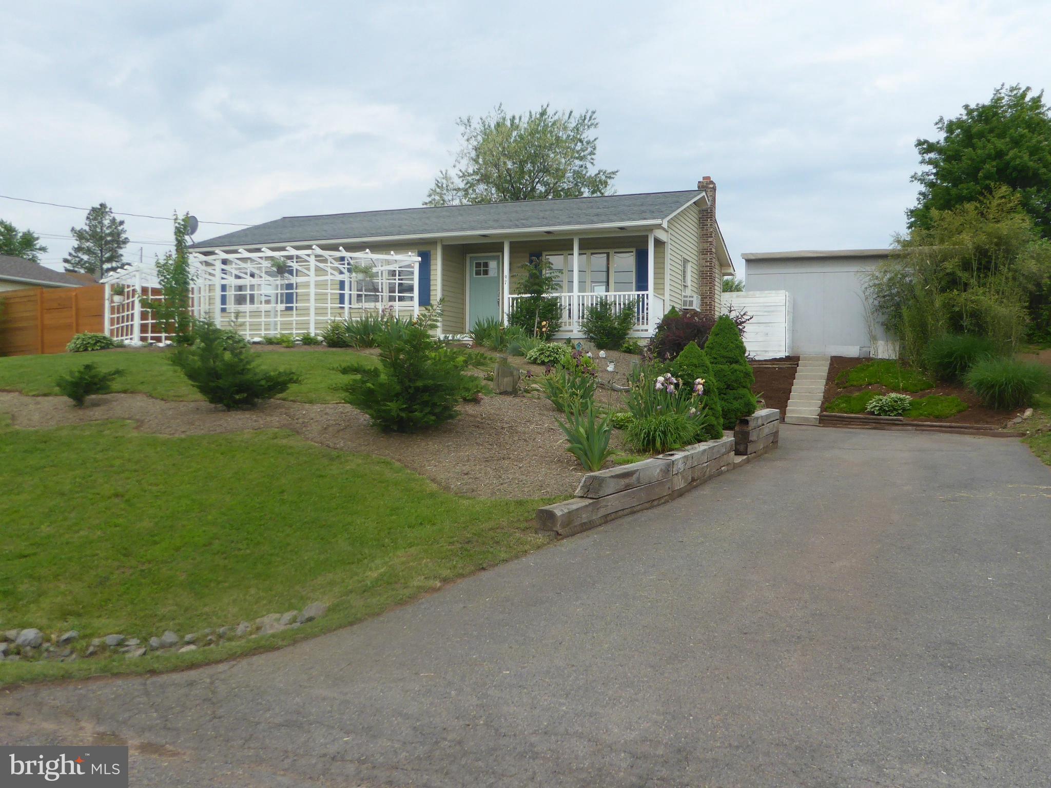 Call now to see this beautifully renovated raised ranch style home with large living room, dining area, kitchen, 2 bathrooms three bedrooms with a fenced backyard. There is a back deck, front porch and large shed for storage. Come to WV and become a Mountaineer