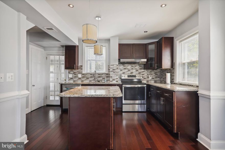 Walk through this lovely colonial home to be greeted by elegant hardwood floors throughout the main level. The formal dining room leads to an open kitchen with granite countertops, stainless steel appliances, modern backsplash, and a kitchen island for entertaining.

The main level also boasts a large living room space with a fireplace and a mantle. There's also a bonus sun-room located on the back of the house that leads you to the spacious back yard.

On the upper level, there's four generously-sized bedrooms and a full bathroom. The laundry is located in the spacious finished basement, perfect an office, recreational space, or storage! The basement also has a separate entrance connecting to the backyard and second full bathroom.

Plenty of room for activities and entertaining outside as well with a lovely backyard containing lots of open space! There's also a long driveway that comfortably fits two cars. Landscaping included with Rent! No need to mow that large lawn, just enjoy!

Located in a central location close to Takoma Park, Langley Park, Hyattsville, and the DC border. On one side, you'll be just minutes from Fort Totten Metro Station, Walmart, Giant, and more. On the other side, convenient and quick access to the Mall at Prince George's, Hyattsville Crossing Metro Station, Hyattsville Art District, University of Maryland, Trader Joe's, Whole Foods, and so much more!

Don't miss out on this beautiful home in an excellent location!