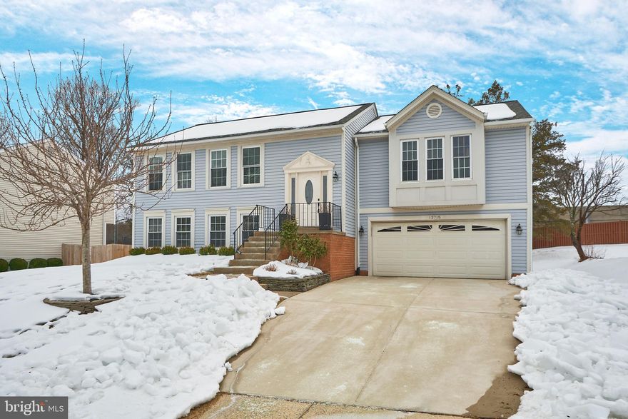 Light filled home, freshly painted  with new carpet  and gleaming hardwood floors sited on a 1/3 acre lot! Sunny  eat in kitchen with 42" maple cabinets, granite countertops, stainless steel appliances, gas cooking  and plenty of cabinet space. French door off the kitchen eat in area to a deck overlooking  private lot with separate garden and paved patio! Large living room with hardwood floors, recessed lighting, and bay window  with charming window seat. Dining room off kitchen with vaulted ceiling and hardwood floors. Primary bedroom  with new m carpet and sliding barn door entry to bathroom with dual vanity, and separate walk in shower, plus  plenty of closet space with custom shelving.  Bedrooms 2 and 3 share hall bath. Lower level walk out basement with 2 bedrooms and full bath, vinyl plank flooring and cozy gas fireplace and built-ins in spacious recreation room. Sliding door to patio and rear yard. Large laundry room and access to 2 car garage!  Total roof replacement and solar panels installed  in 2021! Hot water heater 2020. HVAC 2012.  All this in a community with a low HOA fee and walking paths throughout the community. New playground coming soon! Easy access to Route 28 and I-66 make this a commuter's  dream, while there is shopping, dining and entertainment galore.  Outdoor enthusiasts will love the short walk to Elleanor C. Lawrence Park with wooded walking/hiking trails, a pond for fishing, and an outdoor entertainment amphitheater! OPEN HOUSE SAT. 12:00-2:00 pm