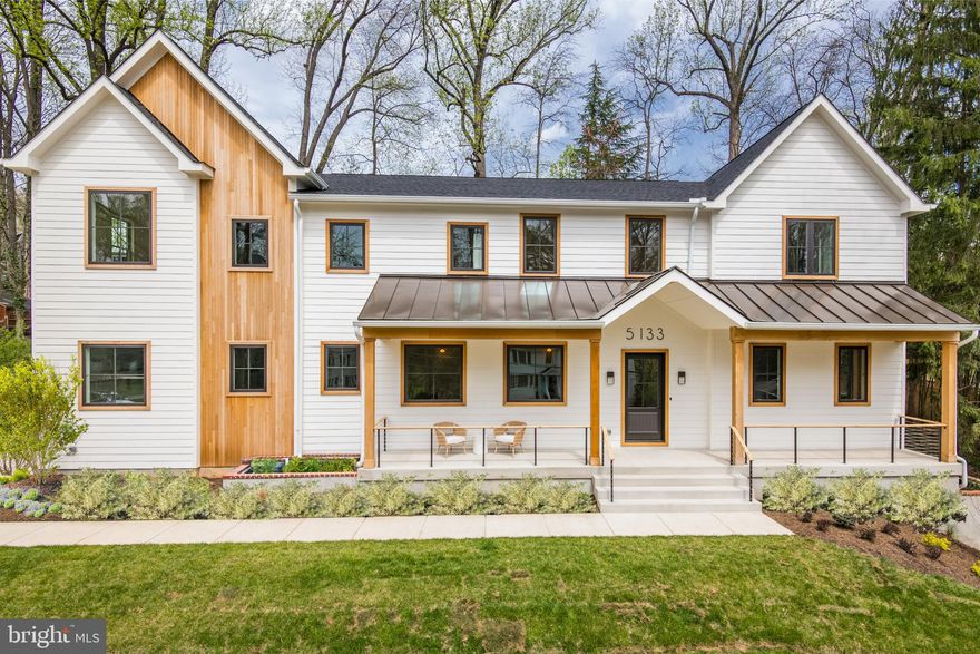 Amazing 5-Star Organic New Construction project collaboration between builder and designer, respectively; The South Hampton Group and HH Designs. Located in the desirable Woodland Acres. Exquisite details abound in every inch of this 8,100 sq/ft  home. The gracious foyer opens into the formal Dining Room with a shiplap wall detail, visitors can either head to the expansive Family Room or visit the 1st floor Library/Formal Living Room. The Butler’s Pantry features Quartz counters, floating shelves, wine fridge and sink.  An entertainer’s dream worthy Kitchen has U-shaped Quartz countertops with bar seating at both ends, center Island, Wolf Range, Sub-Zero fridge and freezer, 2 Dishwashers, built-in microwave, Custom Cabinets, additional butcher blocks counters and floating shelving, and a huge walk-in Pantry. The cozy Breakfast Room has built-ins for extra storage, clad with butcher block counters. The Family Room is a sanctuary with oversized windows, impressive natural gas custom Fireplace and access to the rear yard and Patio. The Main Level also includes two Powder Rooms, Office/Study, a Bedroom with full Bath, and exquisite Mudroom, which is grounded by custom built in cabinetry and privacy slat wall. The Upper Level is established by the light drenched barrel arch, lime wash finished, center hallway. At one end, the Owner’s Suite is an oasis with dramatic 11 ft 4 in. high- wood clad ceilings, incredible custom full ceiling height barn doors, and wood paneled walls. Additionally, a Roman Clay finished gas Fireplace, dual Walk-in Closets and a luxurious Bath with heated floors, separate vanities, free standing ceramic tub, spa shower with dual shower heads, a rainfall shower head and multiple body sprays. The Owner’s suite continues to impress with a Reflection Space that has a custom cabinetry, wine fridge, and wet bar. Additionally, there are 4 distinctive En suite Bedrooms and a Laundry Room setup for double W/D units, butcher block counters, and a built-in pet shower. The Lower Level offers ample relaxation and wellness space with a Full Bar complete with dishwasher, wine fridge, Wine Cellar with glass doors, Fitness Room with custom rock climbing wall, dedicated Media Room, Bedroom with full Bath and huge windows, Recreation Room, Fireplace, and a Walk Out basement. Enjoy your outdoor living with a welcoming Front Porch framed by a custom fabricated cable rail, gracious rear Patio, and amazing flat yard space.  2- car Garage has electric vehicle charge port, pre-wiring for exterior cameras & irrigation system. Located just a short distance to shops, restaurants, schools, Chestnut Hill Park, Washington Golf and Country Club.