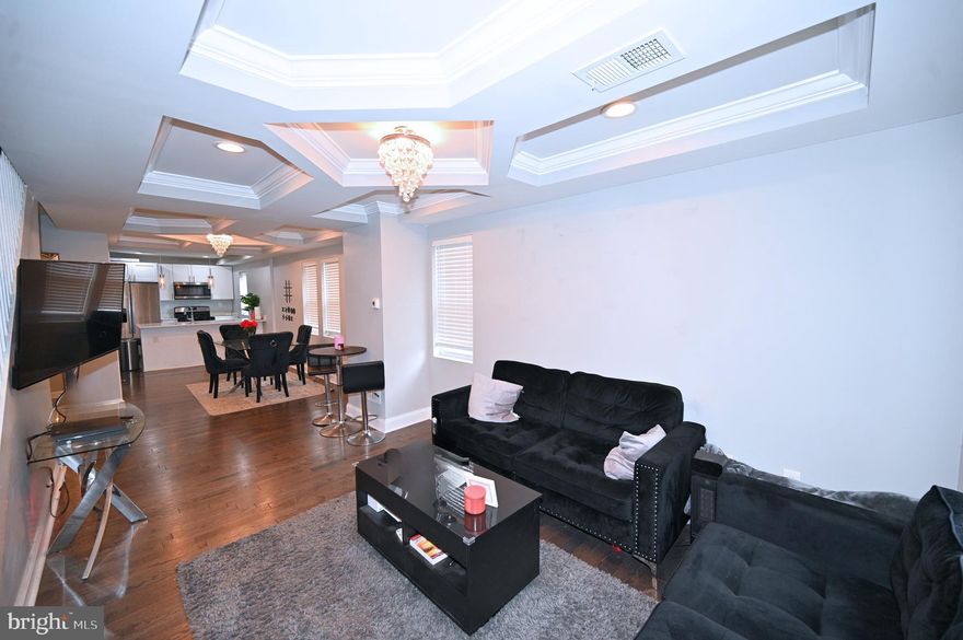4 Bedrooms | 2.5 Baths | Renovated | Includes Adjoining .11 Acre Lot
Welcome to 3700 Flowerton Rd  where modern design meets thoughtful craftsmanship.
This fully renovated 4-bedroom townhome extra-long open floor plan that immediately impresses. From the moment you step inside, you’re greeted by striking coffered ceilings, rich hardwood flooring, abundant recessed lighting, and a contemporary powder room that elevates the main level.
The chef-inspired kitchen is designed for both functionality and flair perfectly for hosting, gathering, and everyday living.
The redesigned lower level offers exceptional flexibility with a spacious bedroom, full bath, and additional entertaining area — ideal for guests, extended family, or a private retreat.
Upstairs, you’ll find three generously sized bedrooms and a beautifully updated primary bath designed with comfort in mind.