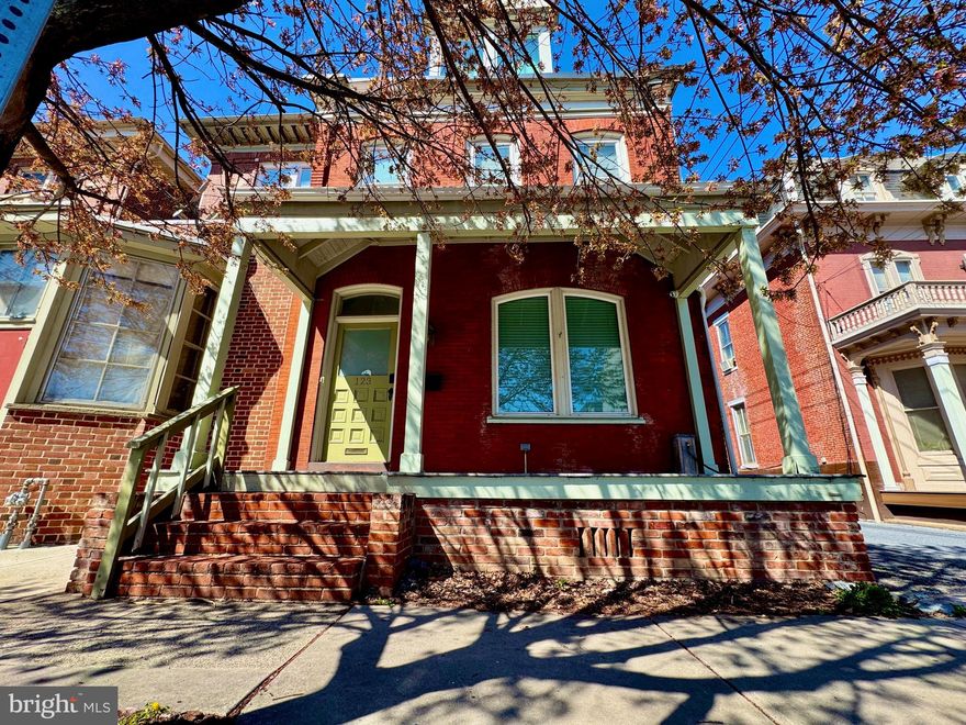 Wow! Priced to sell and turnkey/move in ready! This very unique property boasts a luxurious feel with light and bright finishes, high ceilings, abundant windows, natural light, wood floors, built-ins galore, wood-burning fireplace, 2nd floor laundry, gas heat, central air, 2 parking spaces, & potential for a rooftop deck. ****  Seller has occupied the rear of the home and has the front registered with the City as an operating air bnb that has avg income of $2,700/mo. (The air bnb is permitted because this is an IN HOME AIR BNB. Non owner occupied air bnb would not be permitted. This home is just set up perfectly to do this, should a homeowner wish to. Because of this set up, this home also could be ideal for in-law quarters. **** If occupied as a single family home, all you need to do is remove or unlock 2 interior doors. **** All bedrooms have an en-suite, full bath. The 1st floor has two kitchen/living areas. Both kitchens have gas stoves, stainless steel appliances, islands & more! **** The “front side” features a lovely front porch, and a first floor offering an open kitchen/living room with pocket doors & cozy features. On the 2nd floor you'll find a spacious bedroom with en-suite bathroom, laundry room & a large closet. The 3rd floor is a large bedroom with plenty of natural light a private bath and sliding doors that could lead to the potential rooftop deck! **** The “rear side” features a first floor with very attractive, open living/kitchen space with pantry, wood burning fireplace, powder room and murphy bed. The 2nd floor offers a stunning bedroom with white painted exposed brick and ceiling beams and a spacious en-suite bathroom. This side also has access to the clean basement where a 2nd laundry area is located. ****  Additional Notes: Buyer could install a rooftop deck where the existing sliding glass doors are and have spectacular views and outdoor space! Parking: 1 parking space in the rear driveway and 1 space along the side of the house.  There is no yard, so no lawn maintenance required here! If Buyer would like a yard, the driveway could become an outdoor space or install turf, and you would still have the parking area along the side of the home, and free, easy street parking. **** Location is phenomenal - just a block to LGH, 1.5 blocks to the Belvedere and 12 minute walk to Central Market! **** All furnishings, art and décor were procured by a professional interior designer.  All furnishings, appliances, household goods, kitchen items, décor, etc. are to be sold with the home for just $15,000! **** SEE SELLER RESERVED ITEMS LIST UNDER "Documents".