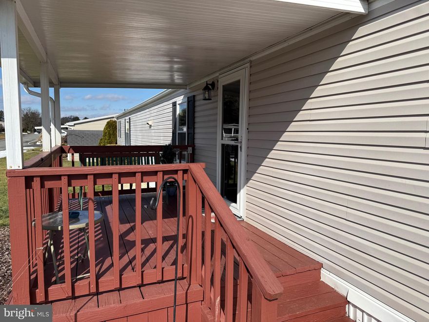 Nicely maintained and well cared for one owner home on a manicured corner lot! Interior features an open floor plan with  cathedral ceiling, kitchen with central island/double sink/breakfast bar, and living room. Spacious primary bedroom  features an adjoining  primary bath and  a walk in closet. Replacement windows! Exterior features a covered deck in front and a relaxing rear patio with some privacy. Refrigerator, washer & dryer, and microwave are included.  Utility shed. 2 off street parking spaces. Very nice home! Flexible possession.  EZ to show!