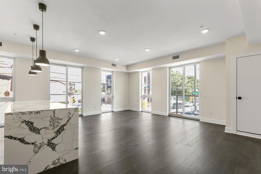 Available Now | Leasing Special: $2,400/month for a 12 month lease or $2,267/month for an 18 month lease! (1 month FREE applied as a monthly discount!)

Welcome to Palm Flats at 1868 Frankford Ave in the heart of Fishtown! Unit #301 is a 2 bedroom, 2 bathroom rental apartment on the third floor. Features include an open floor plan with central air, in-unit laundry, kitchen island, floor-to-ceiling windows, and modern fixtures throughout.

Building Amenities:
Mail Room,
Video Security System,
Elevator,
Shared Roof Deck.

Lease Terms:

Generally, 1st month, 12th month, and 1 month security deposit due at, or prior to, lease signing. Other terms may be required by Landlord. $50 application fee per applicant. Pets are conditional on owner's approval and may require an additional fee, if accepted. (Generally, $500/dog and $250/cat). Off street parking, when available, is $250/month; first come first serve basis. Tenants responsible for: electricity, gas, cable/internet, and water. Landlord Requirements: Applicants to make 3x the monthly rent in verifiable net income, credit history to be considered (i.e. no active collections), no evictions within the past 4 years, and must have a verifiable rental history with on-time rental payments. Exceptions to this criteria may exist under the law and will be considered. Please note: photos are from a similar unit within the building; exact layouts & finishes may vary.