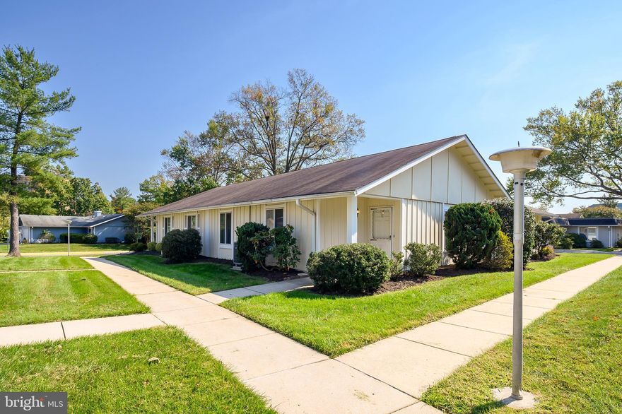 * use Dulwick for Google Maps**. 
55+ adult community of Leisure World. This villa-like Nottingham model is a rambler style situated on a beautiful lot; conveniently located by the main Leisure World entrance. Space galore from the foyer to the large dining room/living room with electric fireplace to the very spacious multipurpose family room addition (with extra large storage room). There's a roomy primary bedroom with en suite bath and a second nice-sized bedroom with a full bathroom featuring a new step-in shower located just outside in the hall.  A built-in everything closet is across from the full washer and dryer laundry closet. A galley kitchen with pass-through into the dining area has a set of sliding glass doors that lead to the inviting fenced-in back patio. Parking for two cars in the driveway and ample street parking. CONDO FEE INCLUDES ALL UTILITIES + ROOF/EXTERIOR MAINTENANCE AND HOA FEE! Also includes 24/7 security, snow and trash removal, state of the art fitness center, pools, tennis courts, and an 18 hole golf course (membership required). There is also a medical center, post office, restaurants, and library all located in Leisure World. The amenities are abundant!
**The buyer pays a 3% fee, or $2000 whichever is greater, to Leisure World toward the Resale Capital Improvement Fund plus a $350 membership transfer fee at settlement**