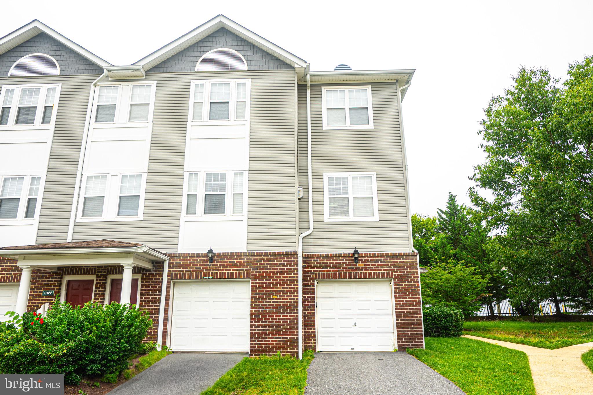 Welcome home to this beautifully appointed 2 bedroom and 2.5 baths Corner Unit Condo. Enter to the lower level from the front door or through the 1-Car garage. Then up to the main level which has upgraded laminated and luxury vinyl flooring throughout and both stairwells have upgraded metal handrails. Main level has an Open floor plan with large living space that flows into the dining room and there is also a quaint half bath on this level. The upgraded kitchen features stainless-steel appliances, an electric oven with an air fryer option, upgraded granite countertops, open shelving, a tile backsplash, and a modern mounted microwave. There is also desk space in this area and plenty of lighting. Upstairs is the primary Owner’s Suite which offers a walk-in closet and an en-suite bathroom with double vanity and a walk-in shower. The second bedroom also has spacious closets and shares an upgraded bathroom with the same stylish finishes. To add an elegant, organized touch, there are Shelving units in primary and secondary bedroom closets. Ceiling fans with remotes in both bedrooms and the living room. Most of the furniture conveys. Community amenities include a Pool, Tot Lots, Grill area, and Clubhouse with a meeting room and exercise room. This home provides easy access to Joint Base Andrews, Joint Base Anacostia-Bolling, Census Bureau, Suitland Naval Installation (ONI), shopping, I-495, and Local Metro. Community NOT FHA Approved. A very well maintained home your Buyers will love. This home is worth a vist and shows exceptionally well. Look to see you soon...