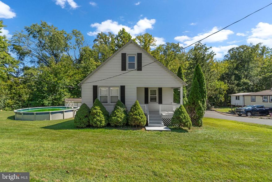 Charming 3-bedroom home featuring a covered front porch and arched doorways between rooms. The main level offers two bedrooms and a full bath for convenient single-level living, along with a kitchen that opens to a large deck overlooking the backyard. The finished upper level provides space for an additional bedroom or home office. The lower level, with walkout access to the yard, presents great potential for added living space. A storage shed and a private setting backing to trees complete the picture. With a little TLC, this home is ready to shine and offers wonderful potential.  Mortgage savings may be available for buyers of this listing.  Pool can be removed at buyers request.