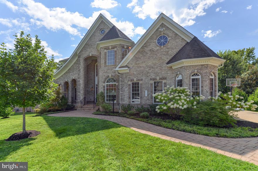 Drastic price reduction! This is a steal of a home for your buyers. 

 This 2016 custom built, all brick home will impress you immediately with the open spaces, room sizes and multiple options for living with delightful luxury details!

We have nearly 6500 sqft* over 3 beautifully finished levels, with sophisticated, contemporary
details throughout plus 5 bedrooms, 5 full baths and two powder rooms. All on a quiet cul de sac street.

The covered dramatic double-door entry leads to a main level with 10 foot ceilings, custom moldings and wide plank Brazilian flooring. Formal dining room is a work of art, with 3 arched entries
and an illuminated tray ceiling. Living room/office is flooded with
natural light, also with tray ceiling.

The open floor plan features a seamless Great room to breakfast to huge gourmet kitchen! Gas fireplace with stone hearth and French doors to balcony overlooking lush and expansive back yard make this such an enjoyable place to relax and entertain.

A sought after and rarely found Main Level Primary bedroom (one of two) is conveniently located to the left. This creates a wonderful option for living with no steps.

The kitchen and breakfast room are breathtaking, and give so much space for cooking, gathering and entertaining big groups. Features a pantry, stainless steel appliances, granite counters and huge island. All are accessible from attached two car garage and mud room/ laundry room.

Luxury features abound such as all five bedrooms have en suite full baths and walk-in closets.

Upstairs is another Primary bedroom, with sitting space by a gas fireplace, private bath with jetted tub and separate seated shower with rainhead showerhead and another walk in closet.


Two additional bedrooms with en suite baths and walk in closets complete this level.

The lower level features a media room, a huge bedroom (21x25), that makes an ideal suite for extended guests, nanny, parents or in laws.
The lower level recreation room is versatile with full sunlight, new carpet, a wet bar, multiple spaces for games and socializing  and French doors that lead out to the private and spacious backyard..

There is even extra insulation in the walls of this home to control sound.

Location is prime – right between Tysons Corner, Falls Church City and McLean, minutes from all area routes, less than  two miles to West Falls Church Metro. McLean HS/Longfellow MS/Lemon Road ES
*estimated, includes garage and open areas