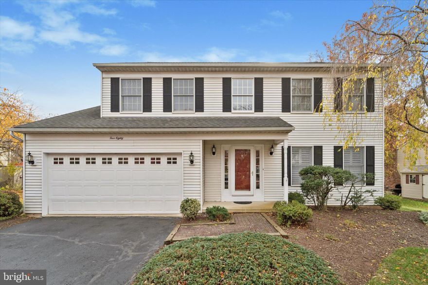 Welcome home to this beautifully maintained 4 bedroom, 2.5 bath residence tucked away on a quiet cul-de-sac, surrounded by mature trees and lush landscaping that create a peaceful, private setting. From the moment you step into the dramatic two-story foyer with gleaming hardwood floors, you’ll appreciate the pride of ownership and timeless elegance throughout.  The bright, inviting living room with floor to ceiling bookshelves flows seamlessly into a spacious dining room featuring hardwood floors, upgraded crown molding, and chair rail—ideal for both everyday living and special gatherings. The generous kitchen connects effortlessly to the breakfast area, where a sunny bow window frames serene views of the rear yard. Granite countertops and a custom tile and mosaic backsplash add both style and functionality for the home chef.  The family room, located just off the kitchen, features a raised-hearth brick fireplace and atrium doors that lead to a custom Trex deck overlooking the landscaped backyard—perfect for relaxing or entertaining in a private outdoor oasis. The full basement offers a finished room with over 400 sq. ft. for work and/or play, plus a large unfinished utility area providing abundant storage.  Unwind in the expansive primary suite, complete with a luxurious, spa-like private bath. Highlights include a freestanding soaking tub, a walk-in, glass-enclosed, tile shower, and beautifully upgraded flooring—your own personal retreat at the end of the day.  This exceptional home offers beauty, privacy, and thoughtful details throughout. Don’t miss out—schedule your private showing today. Homes of this caliber and setting rarely last long!