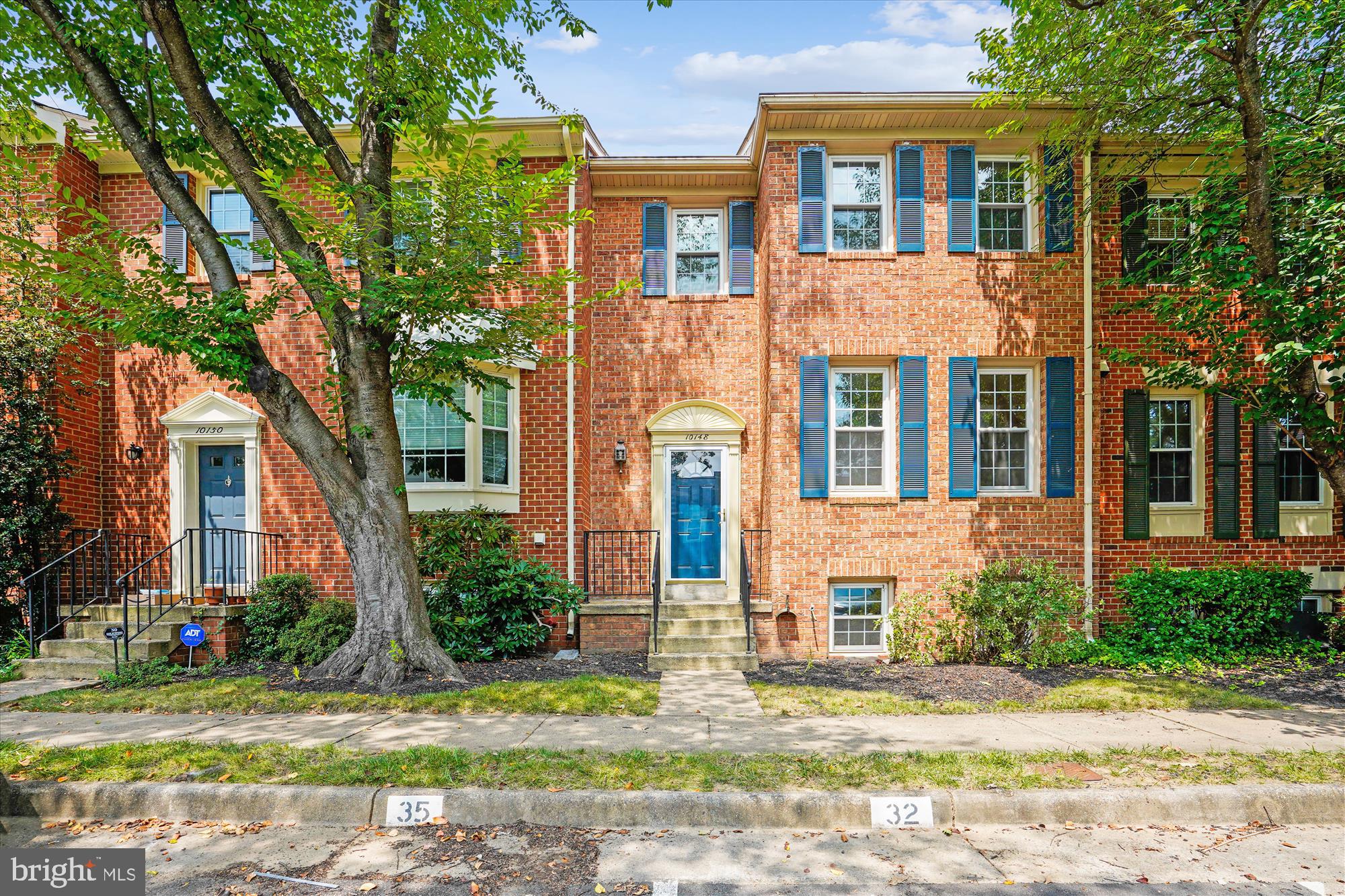 Step into this expansive, three-story townhome, a true gem offering over 2,700 square feet of meticulously designed living space, featuring 4 bedrooms and 3.5 baths. The exterior boasts a classic aesthetic with a full brick facade on both the front and rear, giving the home a timeless and sophisticated feel. Upon entering the main level, you'll be greeted by stunning oak hardwood floors that flow seamlessly through the spacious living and dining rooms. The entire interior was recently painted in neutral colors, sure to complement your furnishings. The kitchen is complete with warm maple cabinets, a pantry closet, elegant granite countertops with tile backsplash, stainless steel finish appliance suite, and durable ceramic tile floors. Adjacent to the kitchen is a sun-filled breakfast room that opens onto a private rear deck, ideal for al fresco dining or enjoying your morning coffee. A convenient half bath completes this level. The upper level is dedicated to rest and relaxation. The primary bedroom is a serene retreat, complete with a luxurious ensuite full bath featuring a double bowl vanity and generous walk-in closet. Two additional, well-proportioned bedrooms share an updated hall bath, ensuring comfort and privacy for everyone. The lower level is an entertainer's paradise. The expansive rec room is anchored by a wood-burning fireplace, providing a warm and inviting atmosphere for gatherings. This level also includes the home's fourth bedroom, which is conveniently located across the hall from a full shower bath. This room would also make a fantastic home office.
Concord Village is an attractive community of all-brick townhomes in a prime location. The Vienna Metro Station is less than 2 miles away and Oakton Shopping Center (Giant Food, Starbucks, banks, restaurants) is just 1.1 miles, offering the perfect blend of suburban tranquility and urban convenience. OPEN SATURDAY 1-3.