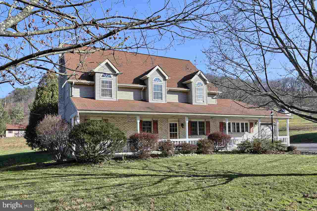 METICULOUSLY MAINTAINED 5 Bedroom 4 Full Bath Home on 4 Acres. This Home Features A Large Country Kitchen and Dining Room with Hardwood Floors. French Doors Lead To The Family Room. The First and Second Floor Each Have A Master Suite With Attached Bath, and Two Additional Bedrooms on Each Level. This Home Is Perfect For Entertaining With A Large Sunroom That Leads to Private Deck Overlooking a Wonderful Backyard. New Furnace and AC was installed in 2015