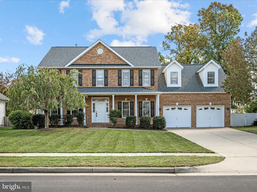 Tucked away on a quiet cul-de-sac in a wonderful, established neighborhood, this beautifully updated home offers the perfect balance of warmth, character, and modern upgrades. Surrounded by mature trees and thoughtful landscaping, the setting feels private yet perfectly located with easy access to Tasker Rd and Route 522 for easy access to town, shopping, and commuter routes. Step inside to find a thoughtfully designed and inviting layout, featuring an office with built-in shelving, a formal dining room with chair rail, and a convenient powder room. The open-concept kitchen and family room area is filled with natural light and anchored by a cozy fireplace, creating the perfect space for everyday living and entertaining. The updated kitchen boasts marble countertops and stainless steel appliances and also provides access to the covered rear deck and spacious, private yard, perfect for gatherings.  Upstairs, the generous primary suite offers a peaceful retreat with its own sitting area and private en suite bath. You'll also find 3 more spacious bedrooms, a shared bath, and the home's laundry room upstairs. The finished basement adds even more versatility, with a full bathroom and space that can serve as a media room, home gym, or potential guest suite with its own private entrance. Outside, enjoy a covered deck with maintenance-free vinyl railings, a lush yard framed by mature trees, and an invisible fence for pets to roam freely. Recent updates include a new roof and gutter guards, updated HVAC and water heater, whole-house humidifier, water treatment system, and sump pump with battery backup, all contributing to peace of mind and low-maintenance living. Lovingly maintained and move-in ready, this home offers timeless appeal in a convenient and sought-after location, come see why 117 Boydton Plank is the perfect place to call home.