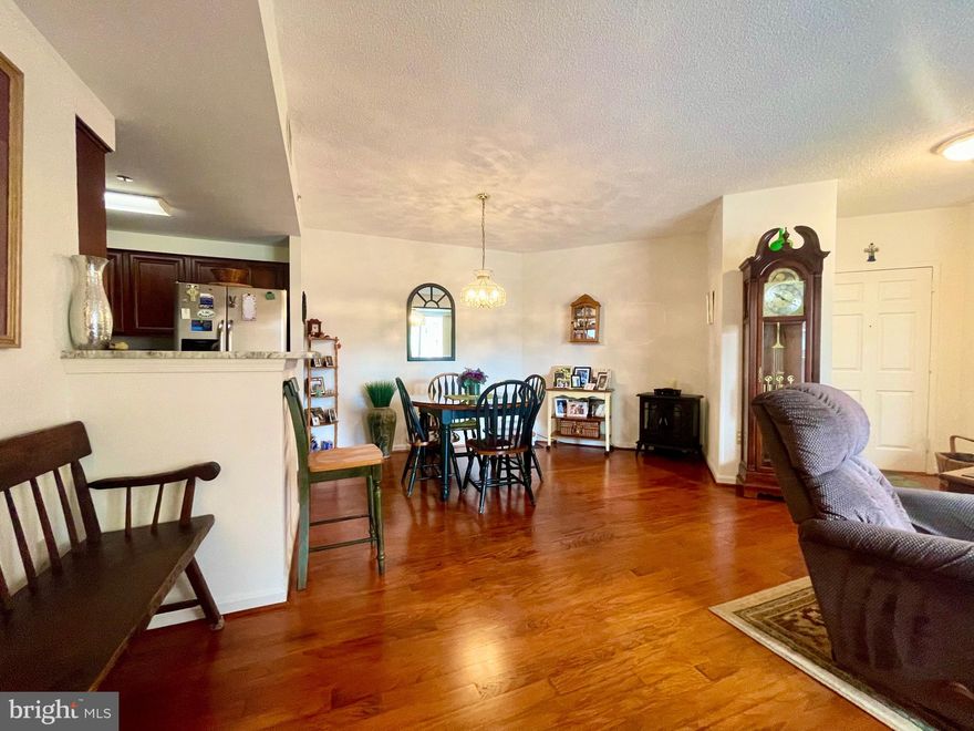 Bright and Airy 2 BR and 2 BA condo in Sought -After Victoria Condominium in Downtown Rockville. Open Floor Plan. Hardwood floor in LR, DR and Kitchen. Granite Counter Tops and Stainless Steel Appliances in Updated Kitchen!  Plenty of Closet Space and a Balcony Overlooking  the Beautiful Courtyard. Washer and Dryer in Unit. One Assigned Parking Space and one Storage Room convey with the Unit. Walk to Metro and Rockville Town Center. Enjoy all the Amenity that Downtown Rockville has to Offer.