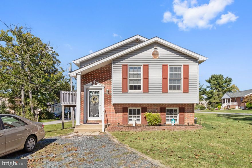 Discover the charm of 2223 Park Drive, a beautifully updated home in the sought-after Baurenschmidt Manor community of Essex, Maryland. This spacious 3-bedroom, 2-bathroom home is perfect for those seeking comfort and convenience. The upper level boasts a large, inviting family room, two generously sized bedrooms, and a modern full bath. Downstairs, you’ll find an additional family room, another bedroom, and a full bath—ideal for guests or extra living space. The updated kitchen offers modern finishes, making meal prep a delight, while the two driveways and oversized two-car garage provide ample parking and storage. There’s even more space available in the basement! Set in a water-oriented, family-friendly community, this home offers a peaceful lifestyle with friendly neighbors and a secure environment. Plus, it’s conveniently located near everything Baltimore has to offer—easy access to dining, shopping, and entertainment. Don’t miss the opportunity to make this stunning home yours!