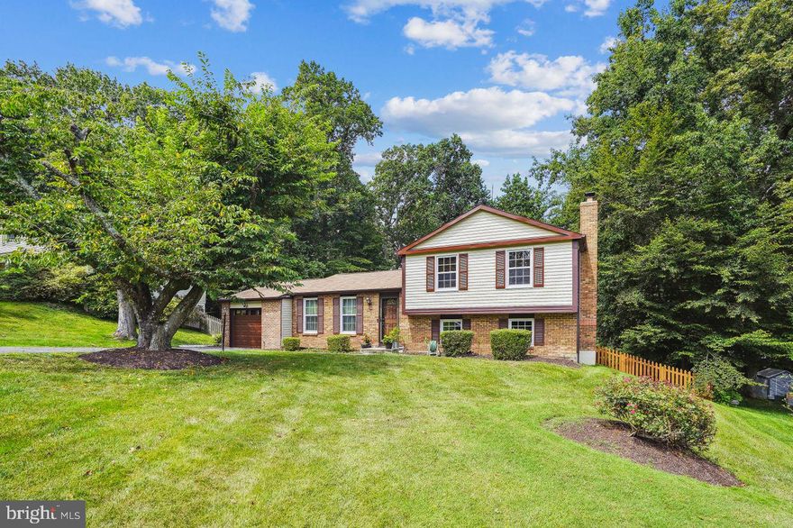 Welcome to the Harbors of Newport!  This lovely community has Leesylvania State Park in its backyard. Less than 5 mins to Interstate 95!  Multiple shopping centers including Wegmans, Mac store, Potomac Mills Mall and more.  Do not miss out on this beautiful 1800sqft split level, 4 bedroom, 3 bath home.  This meticulously maintained residence showcases a perfect blend of elegance and functionality.  Hardwood floors throughout the home with the exception of the lower level has laminate wood floors.  Enjoy family time with hot cocoa in front of a beautiful fireplace.  Spacious living and the dining room leading to the recently updated stained wood deck, where you can relax, and enjoy the peaceful surroundings.  This home is accompanied by a full shed that was converted into a gym with a built in Sauna!