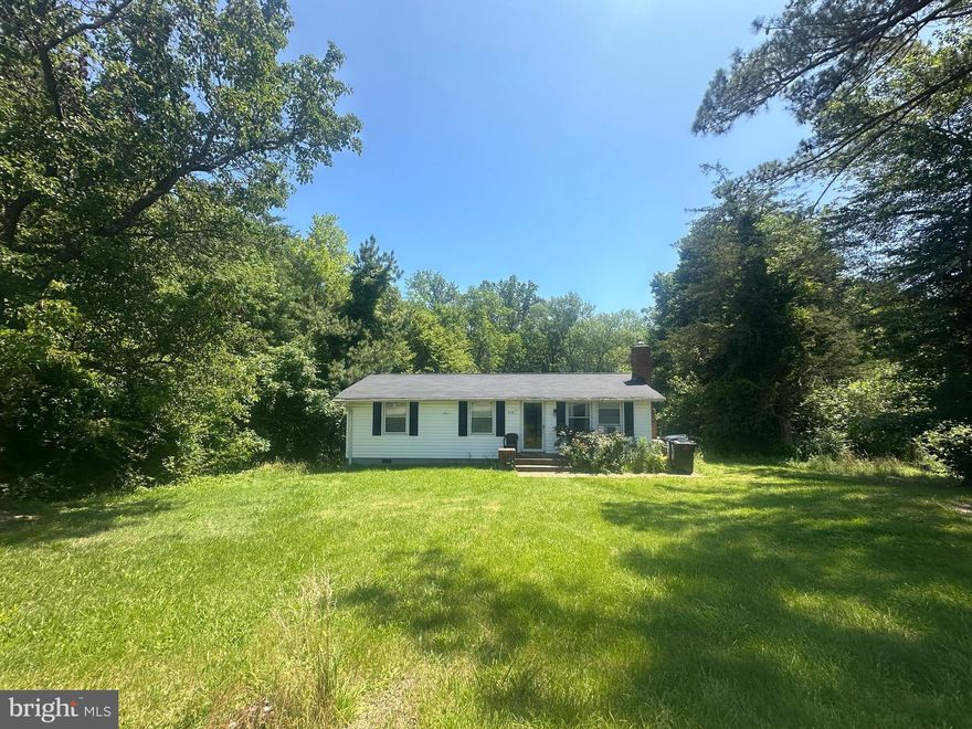 Nestled in a serene and private country setting, this charming 3-bedroom, 1-bathroom home offers the perfect blend of comfort and convenience. Located just 14 minutes from the highway, you’ll enjoy a peaceful retreat while still being close to shopping and major roadways. Step inside to find a cozy living room and all three bedrooms featuring beautiful wood floors that add warmth and character throughout the home. The spacious living area is complemented by ceiling fans in two rooms, ensuring comfort year-round. The updated kitchen boasts oak cabinets, an electric stove, and a sheet linoleum floor, providing both functionality and charm. For added convenience, the home comes with a newer washer and dryer, and the full bath includes a bonus vanity for extra storage space. Recent upgrades include a brand-new water heater, as well as updated electrical lines from the wall to the breaker box, ensuring peace of mind for years to come. Most of the windows have been replaced with newer energy-efficient ones, further enhancing the home’s comfort and efficiency. The home features a walk-in crawlspace, where you'll find newly installed water heater. The property is equipped with a water purification system.While the private backyard offers plenty of room to enjoy nature, please note that the wood deck needs replacing and should not be walked on. The fascia boards are in good shape, although the roof may require some repairs. The home also needs new gutters, and one soffit area has come through. Newer septic system installed. HVAC system is currently not working. This home is a fantastic opportunity for those seeking a fixer upper. Sold as is