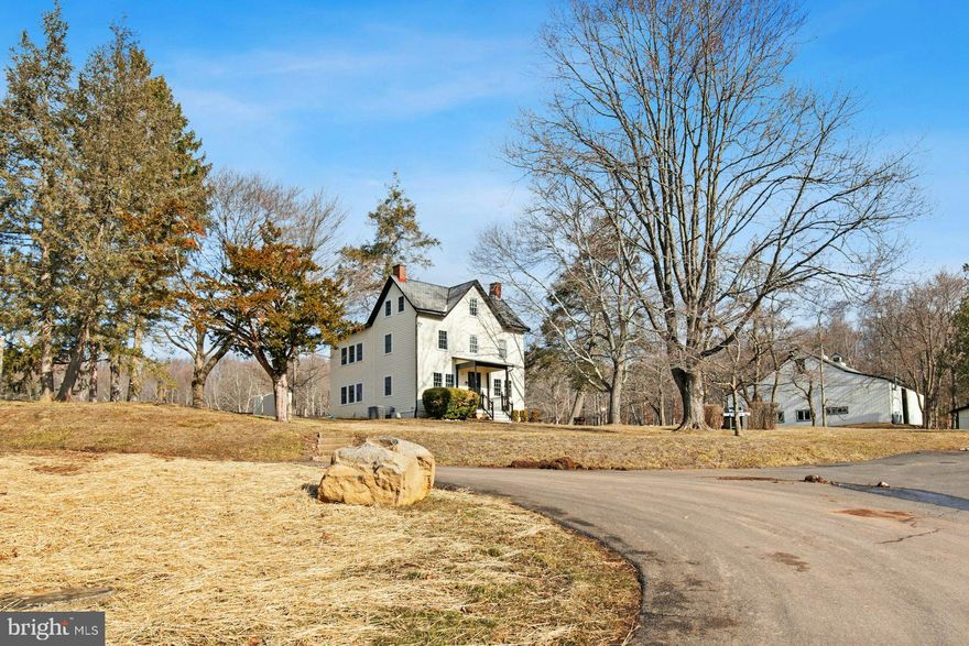 Welcome to Elk Creek Farm — a rare opportunity to lease a charming Victorian-era guest home nestled within a breathtaking nearly 200-acre working Black Angus cattle farm in scenic Bucks County, Pennsylvania. Just minutes from the vibrant shops and restaurants of New Hope, this beautifully preserved property offers peaceful country living in a setting rich with history, dating back to the original William Penn land grant.  A tree-lined drive winds through rolling pastures and expansive meadows, leading to this delightful circa 1911 guest home. Blending period charm with modern comfort, the home features abundant, energy-efficient windows that fill the interior with natural light and offer sweeping, panoramic views of the surrounding countryside.  This private residence is part of an extraordinary compound that includes the main house, caretakers’ quarters, and historic outbuildings. With gracious indoor living spaces and tranquil outdoor scenery, the home is ideal for those seeking a quiet retreat surrounded by nature, yet conveniently close to the cultural richness of Bucks County.