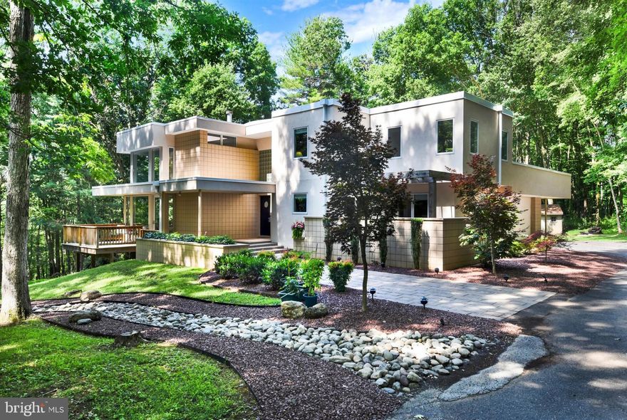 Welcome to your dream home nestled on a picturesque 11.27-acre lot, surrounded by pristine woodlands teeming with wildlife, including graceful deer and playful foxes. This contemporary gem offers a harmonious blend of modern design and natural beauty, creating an idyllic retreat for those seeking tranquility and luxury.
As you step inside, you'll be captivated by the open and airy two-story living room with wood burning fireplace, bathed in abundant natural light streaming through floor-to-ceiling windows. The panoramic views of the lush greenery create a seamless connection with nature, inviting a sense of calm and serenity into your everyday life.
Recent updates have transformed this residence into a haven of comfort and style. Brand-new carpeting graces most of the house, lending a cozy and inviting atmosphere. The lower level family room boasts gleaming new laminate flooring, providing a perfect space for relaxation and entertainment.
With its thoughtful layout, this home caters to multi-generational living. Discover a convenient main-level in-law suite, offering privacy and independence for your loved ones. Upstairs, four bedrooms, master bath and a hall bathroom ensure ample space for family members or guests. The master suite boasts a spacious layout, complete with walk-in closets, providing a luxurious retreat within the comforts of your own home.
The heart of this residence is the stunning remodeled kitchen, which received a makeover just last year. Immaculate stainless steel appliances, sleek new cabinets, and elegant quartz countertops combine to create a culinary oasis. Whether you're a gourmet chef or a casual cook, this kitchen is sure to inspire your culinary creations and become a central gathering place for friends and family.
Imagine unwinding on your composite deck, enveloped by the soothing sounds of nature. The accompanying pergola adds a touch of elegance and shade, making it the perfect spot for outdoor dining or simply basking in the beauty of your surroundings. A sunroom awaits you with its tray ceilings, providing an oasis of relaxation where you can enjoy your morning coffee or immerse yourself in a good book.
Additional features include a spacious two-car oversized garage, offering ample storage and convenience for your vehicles and belongings. Embrace the joys of outdoor living with an inviting firepit, ideal for cozy evenings under the stars. An extra shed provides additional storage space for all your outdoor equipment and seasonal items.
With its seamless fusion of contemporary design, natural surroundings, and modern updates, this home is the epitome of luxury living. Don't miss the opportunity to make this enchanting property your own. Experience the serenity, embrace the elegance, and start living your best life today.   Quick access to Rt 795