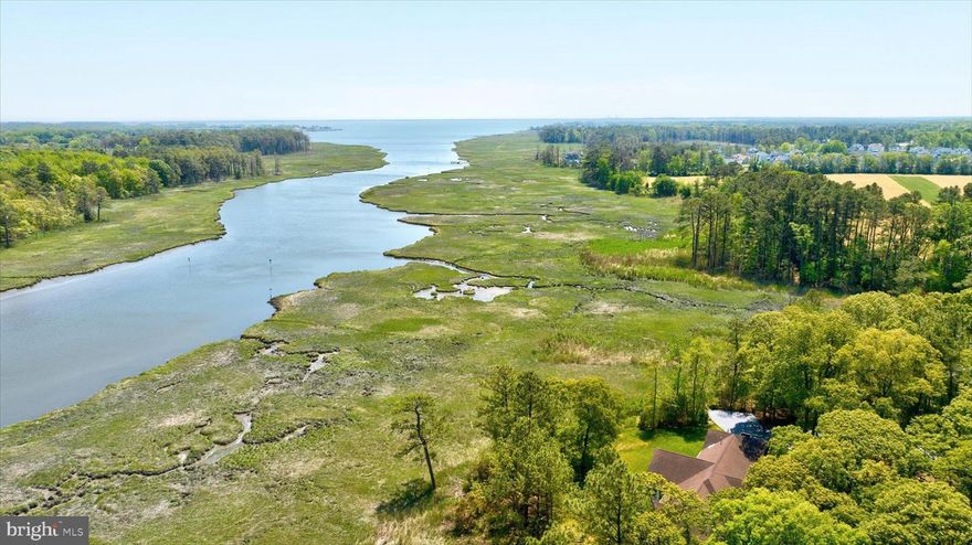 Welcome to 34 Love Creek Drive, 4.6 +/- waterfront acreage, centrally located and a short drive to downtown Lewes, the Cape May Lewes Ferry, and Rehoboth Beach. Reside, renovate, or expand to your liking. 

The existing single level, 3 BD, 2 1/2 BA, 2 car garage coastal residence is serviced by water, sewer, and optic cable, situated at the end of a private paved lane. Tucked away behind a stone wall and grove of mature trees, just off Rt. 1 and 24, at the end of the Love Creek Woods community. 

New Irrigation and Well keep the landscaped grounds lush and for easy maintenance. Enjoy the sweeping panoramic Love Creek waterfront views, teaming wildlife and prolific birds from the current sunroom, screened porch and residence. 

Self-managed HOA, with a low fee, covers a Clubhouse and Pool, available for private gatherings. 

Create one's own secluded oasis on this special rare Waterfront Opportunity Acreage. 

No builder Tie-in, nor required timeline. Call for more information and details on this rare opportunity and make this property your own!