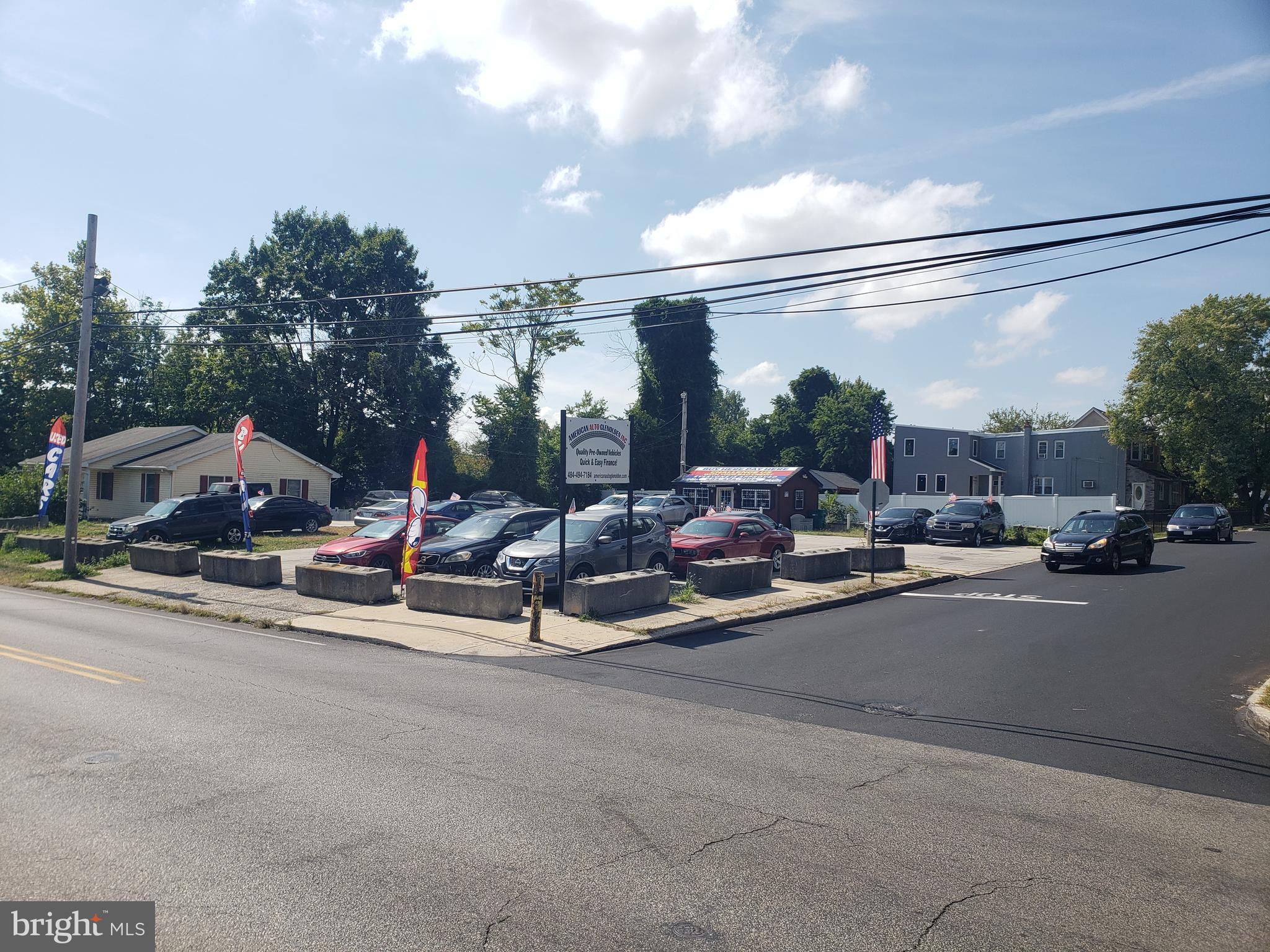 Small car lot with small sales office. Good access and visibility.