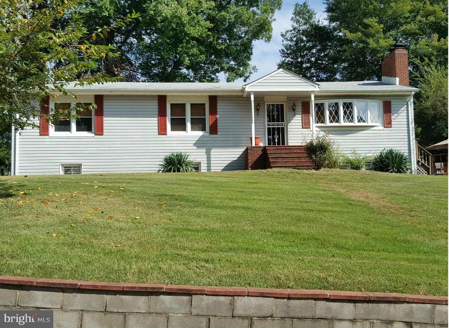 Great space! 6 bedrm/3 bth rambler w/basement. 3000+ sq ft, nestled on private lot. Wrap-around deck. 3 fireplaces! Hardwood flrs. Master bedrm w/walk-in closet/attached bth. Eat-in kitc w/granite/stainless appliances. Sep Din/Liv Rm. Basement has 3 bedrms, full bath, cozy family rm w/fireplace PLUS kitchenette, laundry rm, storage rm. Close to MGM, Nat'l Harbor, metro/military bases & more!