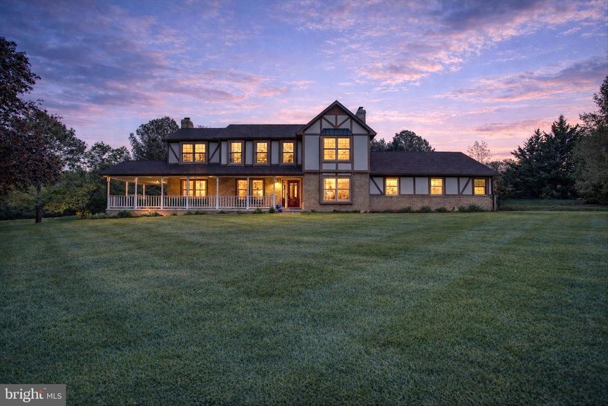 Experience true Boonsboro charm in this striking 4-bedroom, 2.5-bath Tudor-style home nestled on a lush 8.24 acre lot!  Includes 8001B Mapleville Rd - 1.66 acre (perc approved) parcel! The property offers unmatched scenic vistas and pastoral views, providing a peaceful rural retreat. Inside, you'll find over 2,500 square feet of livable space across three levels. The heart of the home features a warm living area with a woodstove, perfect for family game nights or cozy winter evenings. The partially finished basement is ready to become a dedicated playroom, or a quiet home office for remote work, also equipped with a wood stove.   The Primary Bedroom has cathedral ceilings with a beautifully updated En Suite with walk in closet. Home Updates Include:  New Primary En Suite, Refinished Hardwood Flooring throughout, New Carpet, New Stove & Microwave, New Roof on Main portion of home & porch, New Trex Deck with Hot Tub, and Attached Extended 3-Car Garage for those fishing boats or long trucks!  With 8.24 acres of private land, there is plenty of room for a backyard pool, a custom play set, or even a small hobby farm. The property’s size ensures a safe, quiet environment for kids and pets to roam.  Enjoy the peace of mind that comes with living in one of the most sought-after school clusters in Washington County. The home is 1 mile from the central campus featuring Boonsboro Elementary, Boonsboro Middle, and Boonsboro High School, which recently achieved a prestigious five-star rating. A short drive brings you to the historic downtown, home to family favorites like Shafer Park for playgrounds. Explore the nearby Greenbrier State Park for swimming and hiking, or take the family for ice cream at the local-favorite South Mountain Creamery. Benefit from easy access to I-70 and Route 40, keeping you connected to the amenities of Frederick and Hagerstown while living in a peaceful rural oasis.  8001 Mapleville Rd isn't just a house; it’s the backdrop for your family’s next chapter. Experience the best of Boonsboro living where community, nature, and education meet.

**** ALSO INCLUDES- LOT 1A 1.66 ACRES 8001B MAPLEVILLE ROAD