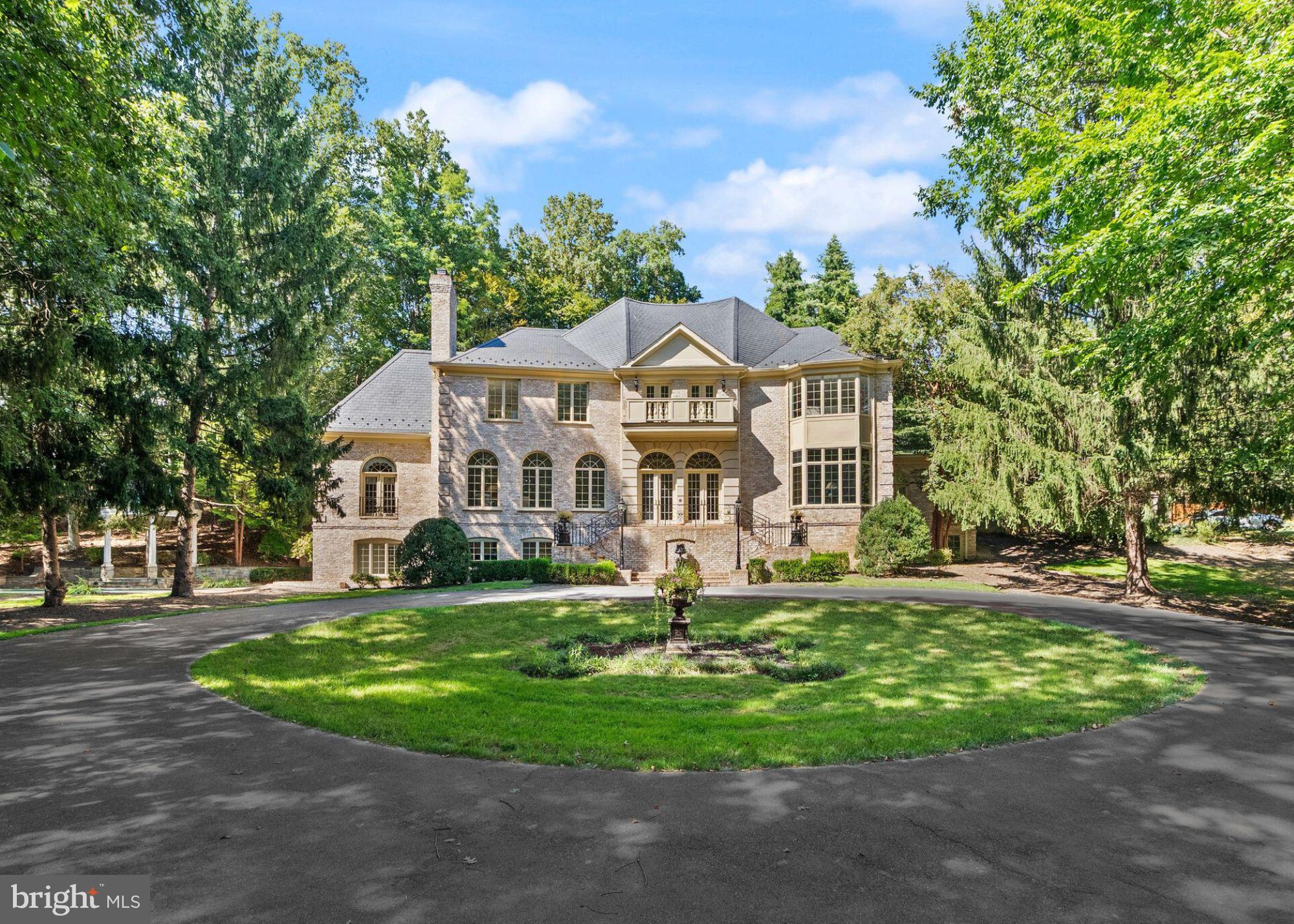 Welcome to 9721 Sorrel Avenue – Architectural Grandeur Meets Modern Luxury in the Heart of Potomac
Designed by esteemed architect John Leslie Neufeld, this exceptional estate is set in one of Potomac’s most prestigious and serene neighborhoods. A masterful blend of timeless elegance and modern luxury, this residence offers a rare opportunity to experience truly elevated living.
From the moment you arrive, the home impresses with striking curb appeal, featuring a 100-year genuine slate roof, a formal circular driveway, and a separate private family motor court—all nestled within professionally landscaped grounds. The architectural design is both breathtaking and unique, showcasing "curves on curves", expansive vistas, and a presence that is both stately and inviting.
Step inside to discover expansive, light-filled interiors adorned with beautiful custom plaster moldings, rich hardwood floors, soaring ceilings, and intricate millwork. The formal living and dining rooms are perfect for sophisticated and grand scale entertaining, while the open-concept family room—bathed in sunlight from walls of windows and an expansive skylight—offers a cheerful and welcoming space for everyday living.
At the heart of the home is the gourmet chef’s kitchen, outfitted with top-of-the-line appliances, custom cabinetry, a large center island, and a convenient back staircase to the upper level.
The home also features an extraordinary hand-carved walnut library, an architectural showpiece that exemplifies craftsmanship and warmth. A series of specialty rooms add a sense of fun and exclusivity, including a disco lounge, a golf simulator room, and a game room, making this residence ideal for entertaining on every scale.
Upstairs, the luxurious primary suite offers a peaceful retreat with a spa-like bath, dual walk-in closets, and a cozy sitting area with a custom marble fireplace. Each additional bedroom is generously sized and includes its own private en-suite bathroom, ensuring comfort and privacy for family and guests alike.
The walk-out lower level provides even more space for recreation, fitness, or extended-stay living—whether used as a home theater, gym, playroom, or au pair suite.
Outside, the estate unfolds into a private oasis featuring a gazebo with a copper roof, a fountain with classical statues, an expansive patio for al fresco dining, and a lush, manicured lawn surrounded by mature trees—offering year-round beauty and privacy.
Ideally located near top-rated schools, Potomac Village, parks, and major commuter routes, 9721 Sorrel Avenue is as practical as it is breathtaking.
This is more than a home—it’s a lifestyle of architectural brilliance, thoughtful luxury, and unparalleled elegance.
Come experience the extraordinary.